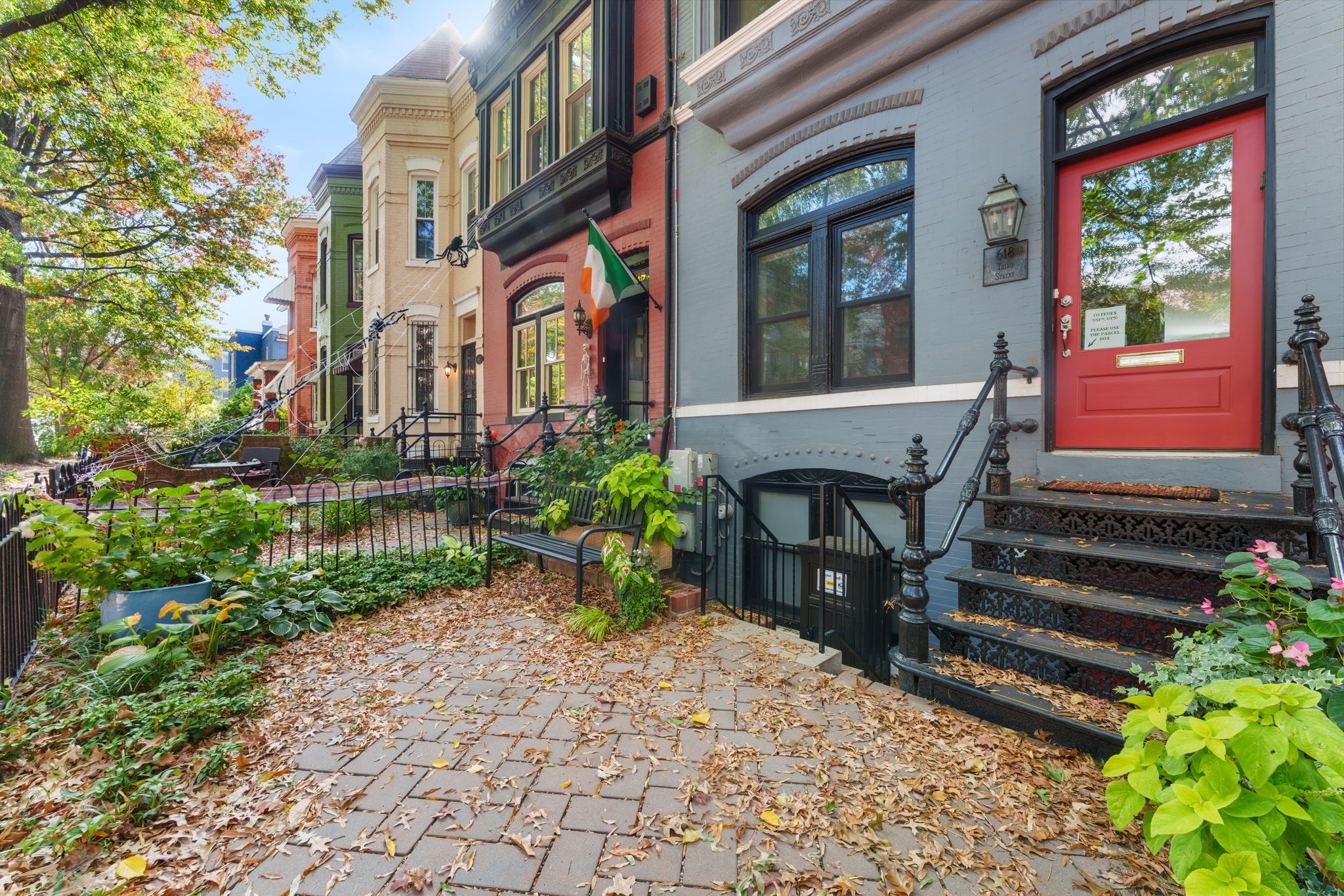 618 3rd Street Northeast Washington, DC 20002 - Photo 2 of 7 a view of a chair and table in the backyard with potted plants