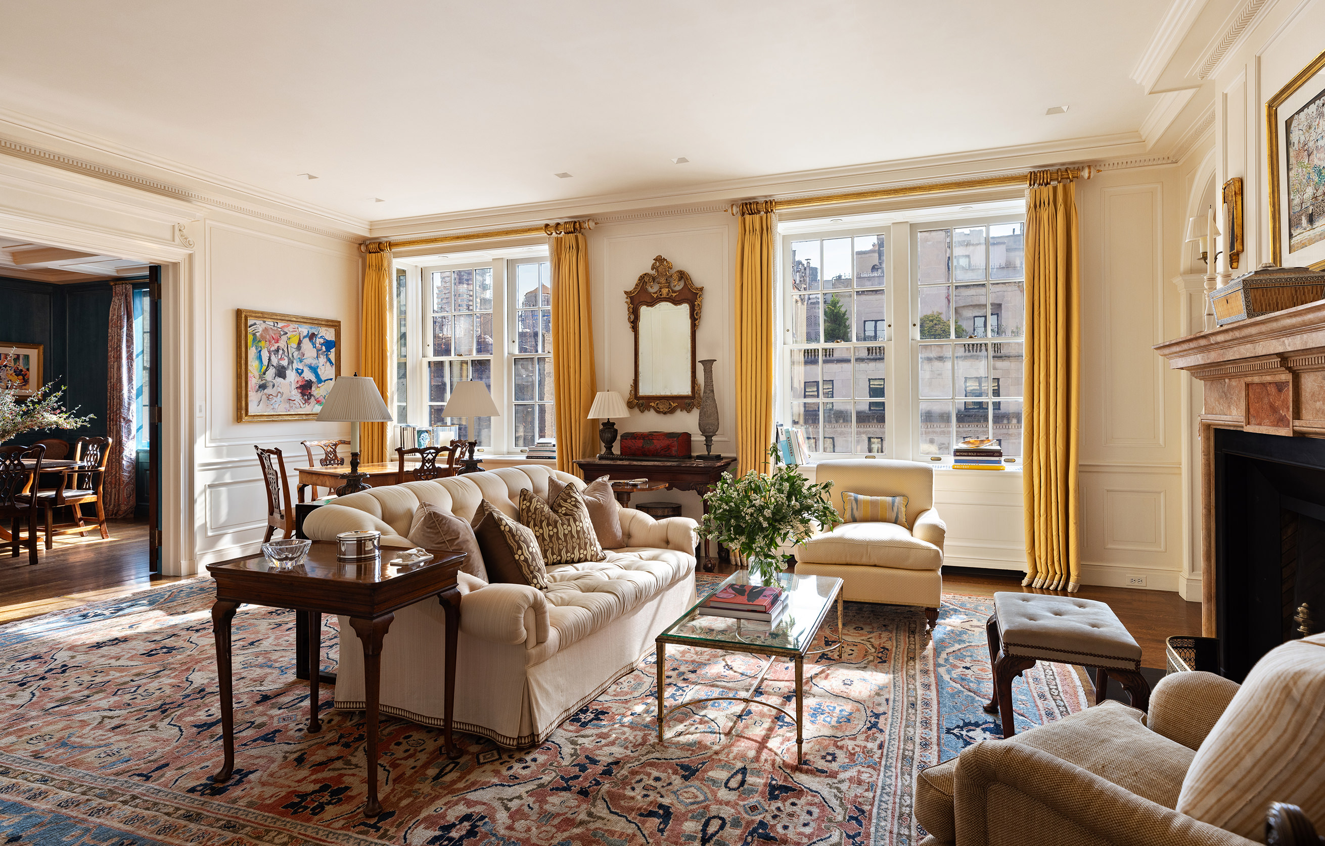 620 Park Avenue, Unit 14 Manhattan, NY 10065 - Photo 13 of 32 a living room with furniture and a flat screen tv