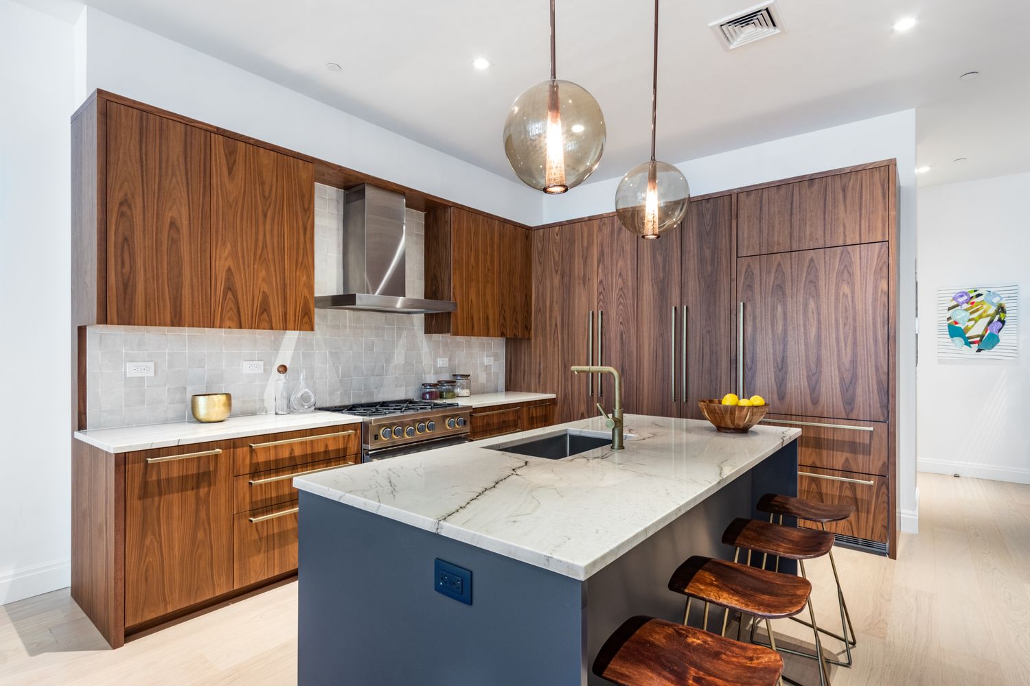 106 Franklin Street, Unit 2 Manhattan, NY 10013 - Photo 2 of 20 a kitchen with a sink cabinets and wooden floor