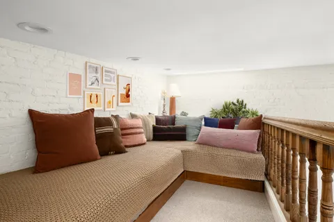 a bedroom with furniture and a couch