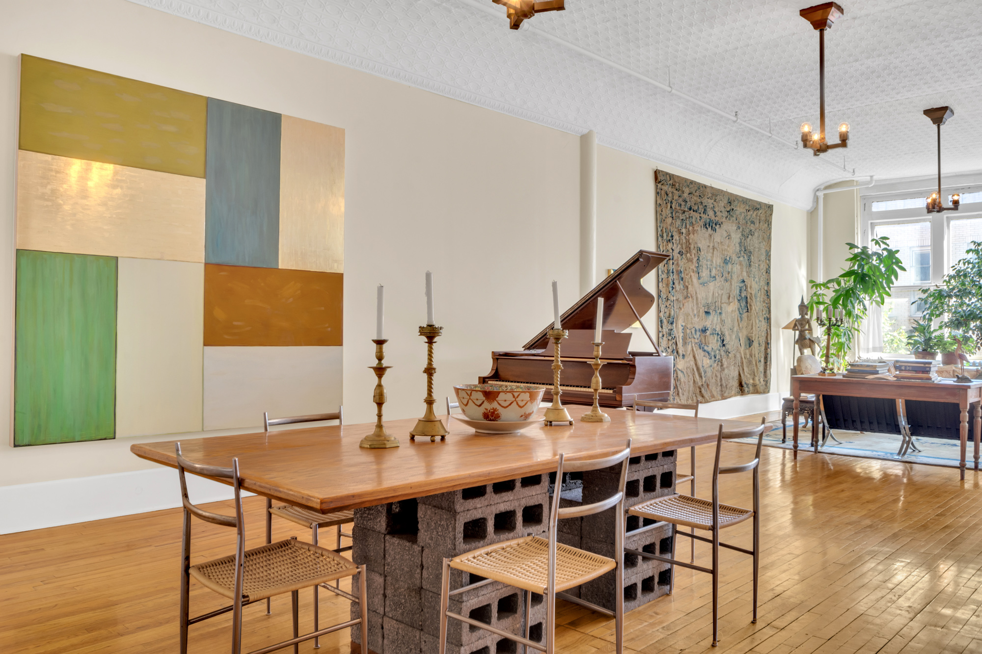 69 Wooster Street, Unit 3 Manhattan, NY 10012 - Photo 5 of 22 a view of a dining room with furniture and wooden floor