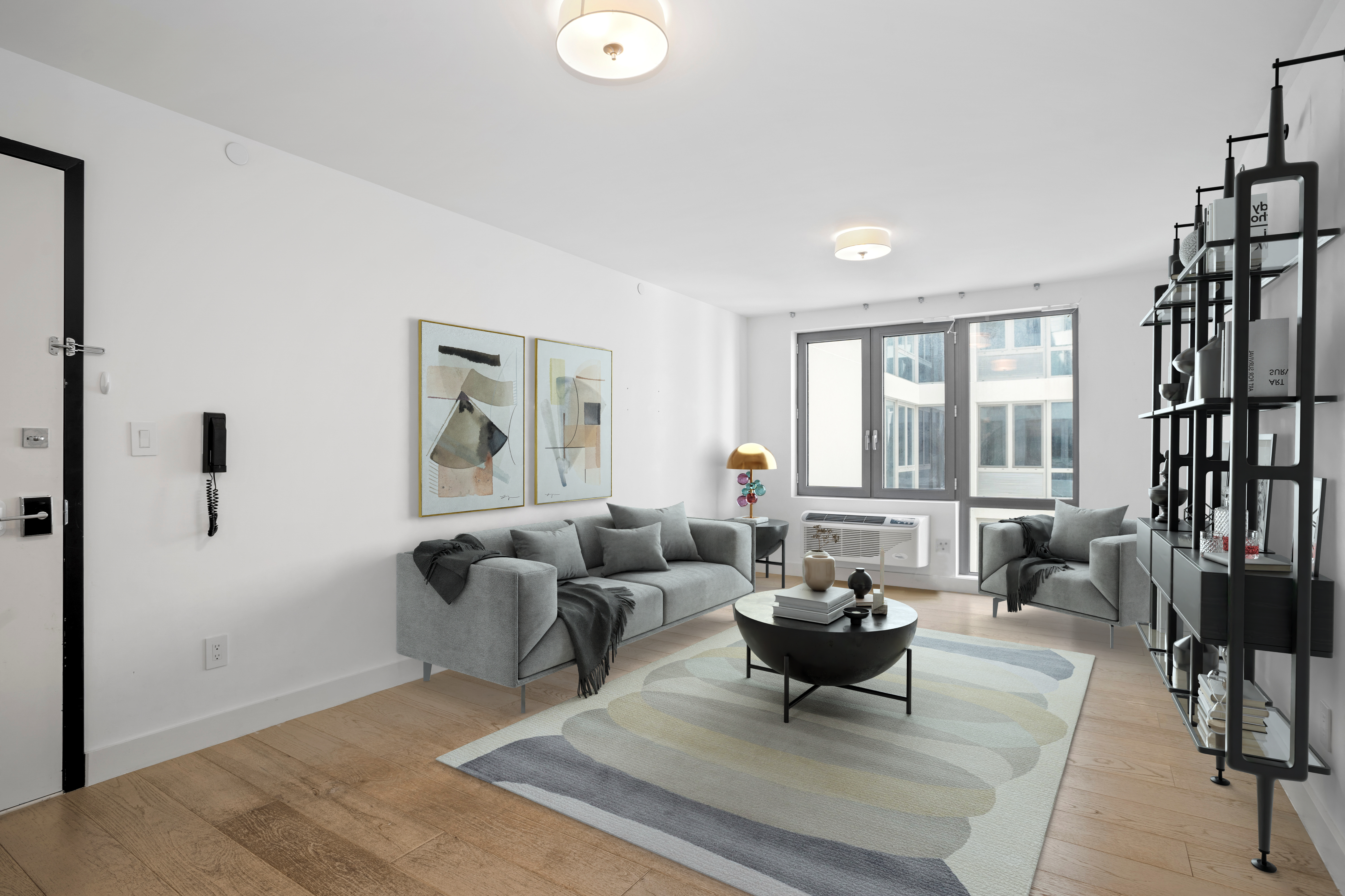 a living room with furniture and a large window