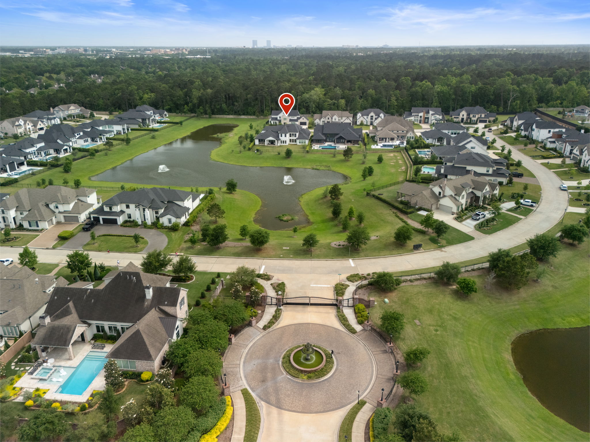 2118 Bennet Court Conroe, TX 77384 - Photo 2 of 70 an aerial view of a house with a swimming pool