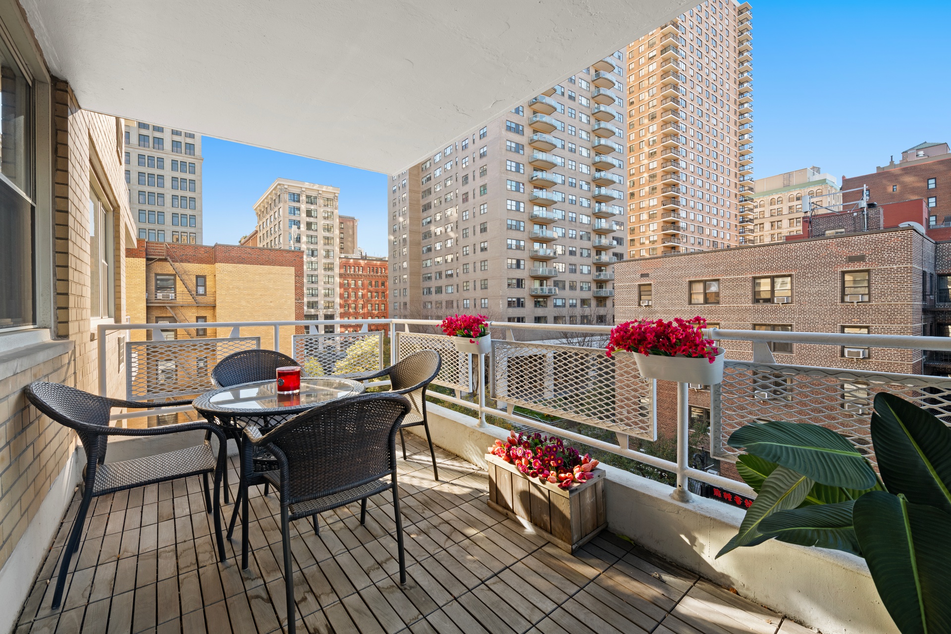 40 East 9th Street, Unit 6M Manhattan, NY 10003 - Photo 2 of 22 a view of roof deck with couch and chairs