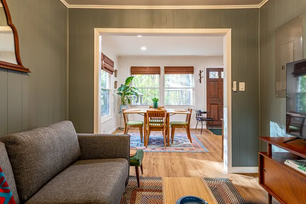 a kitchen with stainless steel appliances a refrigerator and a stove top oven