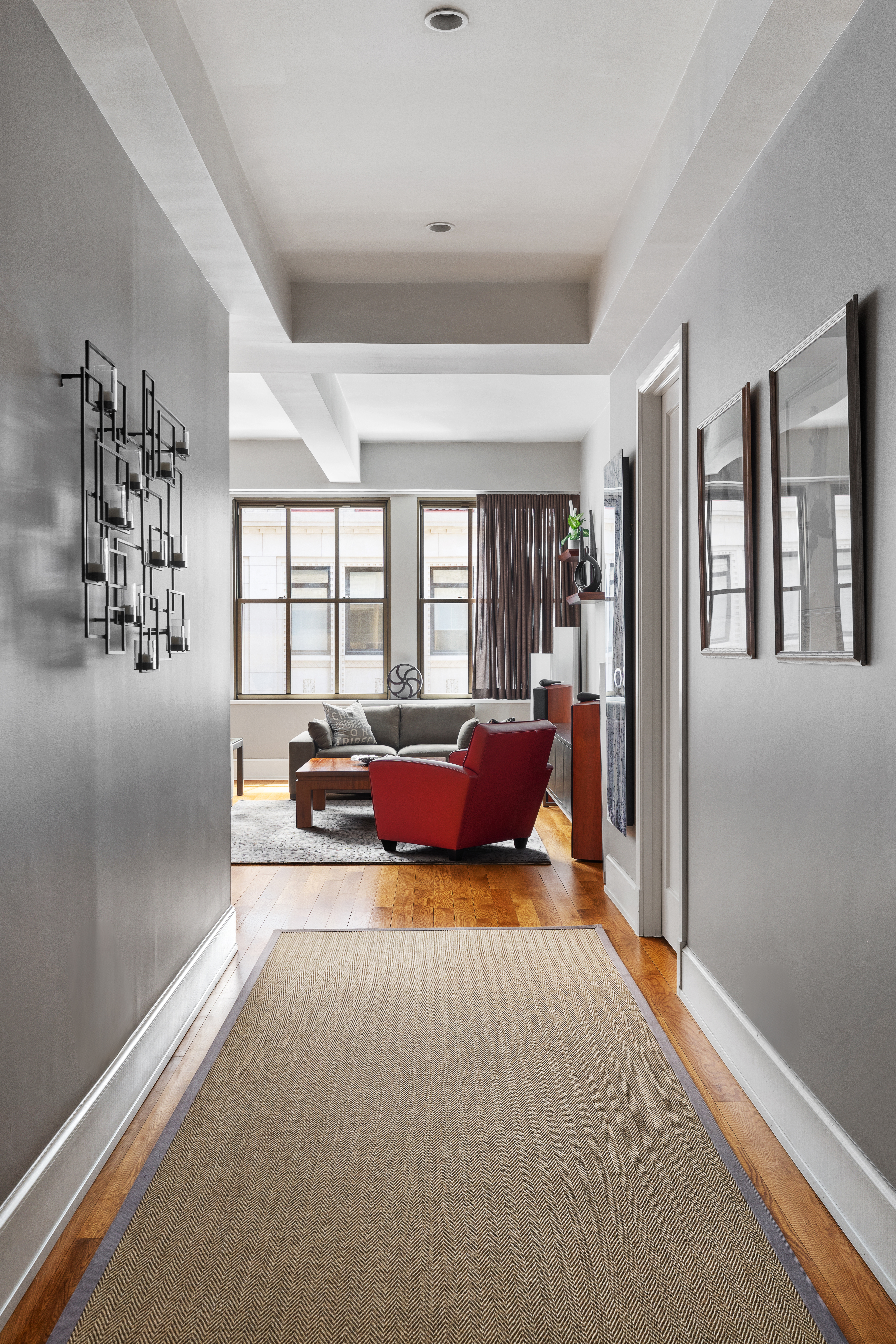 130 West 30th Street, Unit 3B Manhattan, NY 10001 - Photo 14 of 15 a bedroom with furniture and a large window