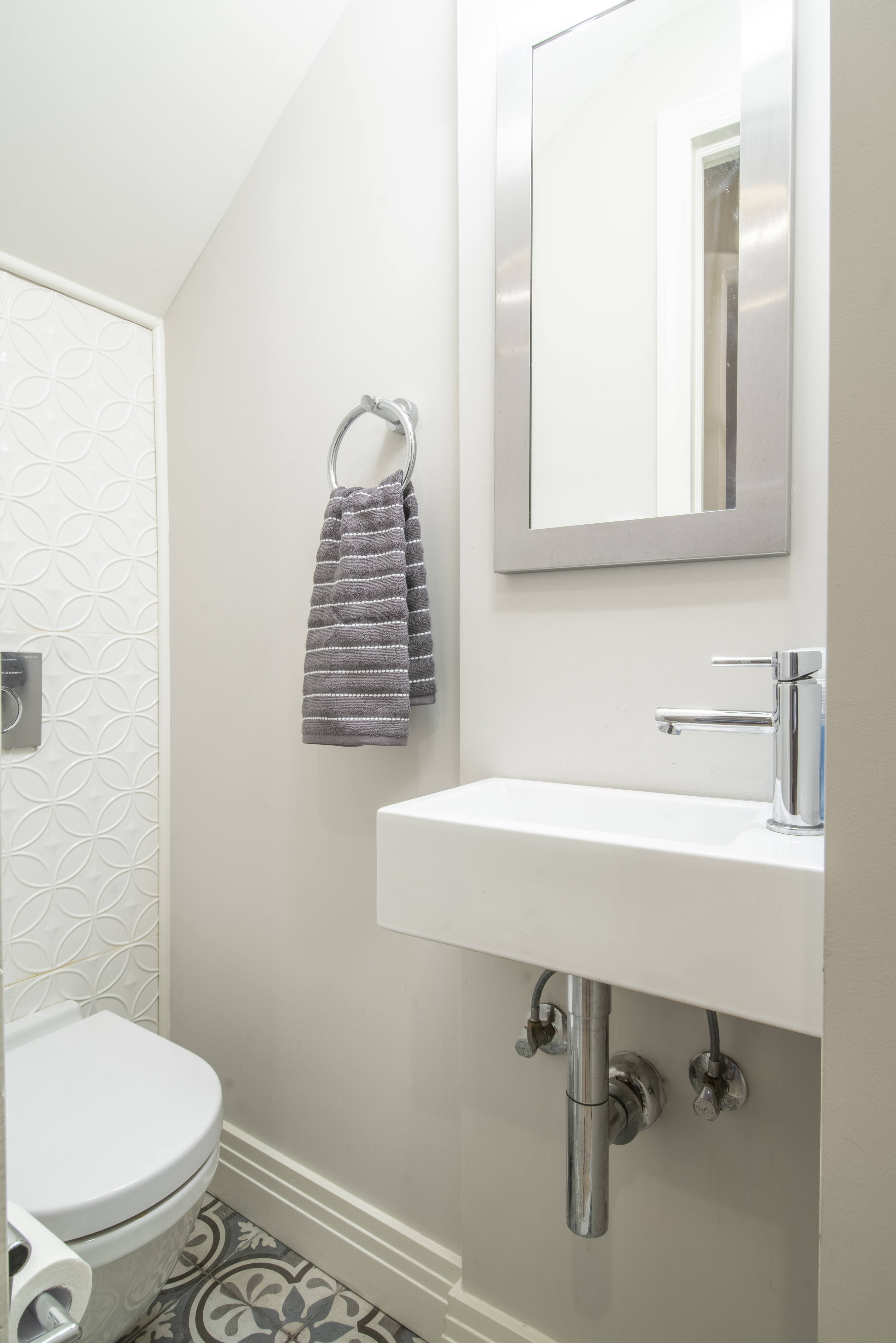 407 East 12th Street, Unit 1RSE Manhattan, NY 10009 - Photo 6 of 13 a bathroom with a sink a toilet and mirror