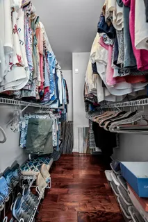a room with lots of different colored cloths