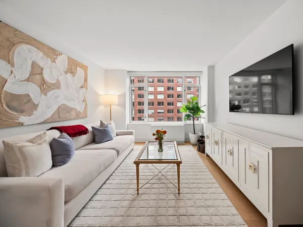 a living room with furniture and a couch