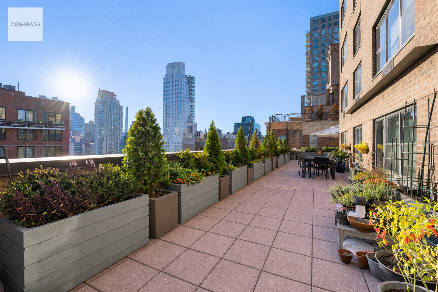 a view of a terrace with sitting area