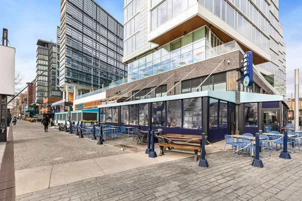 a view of a building with sitting area