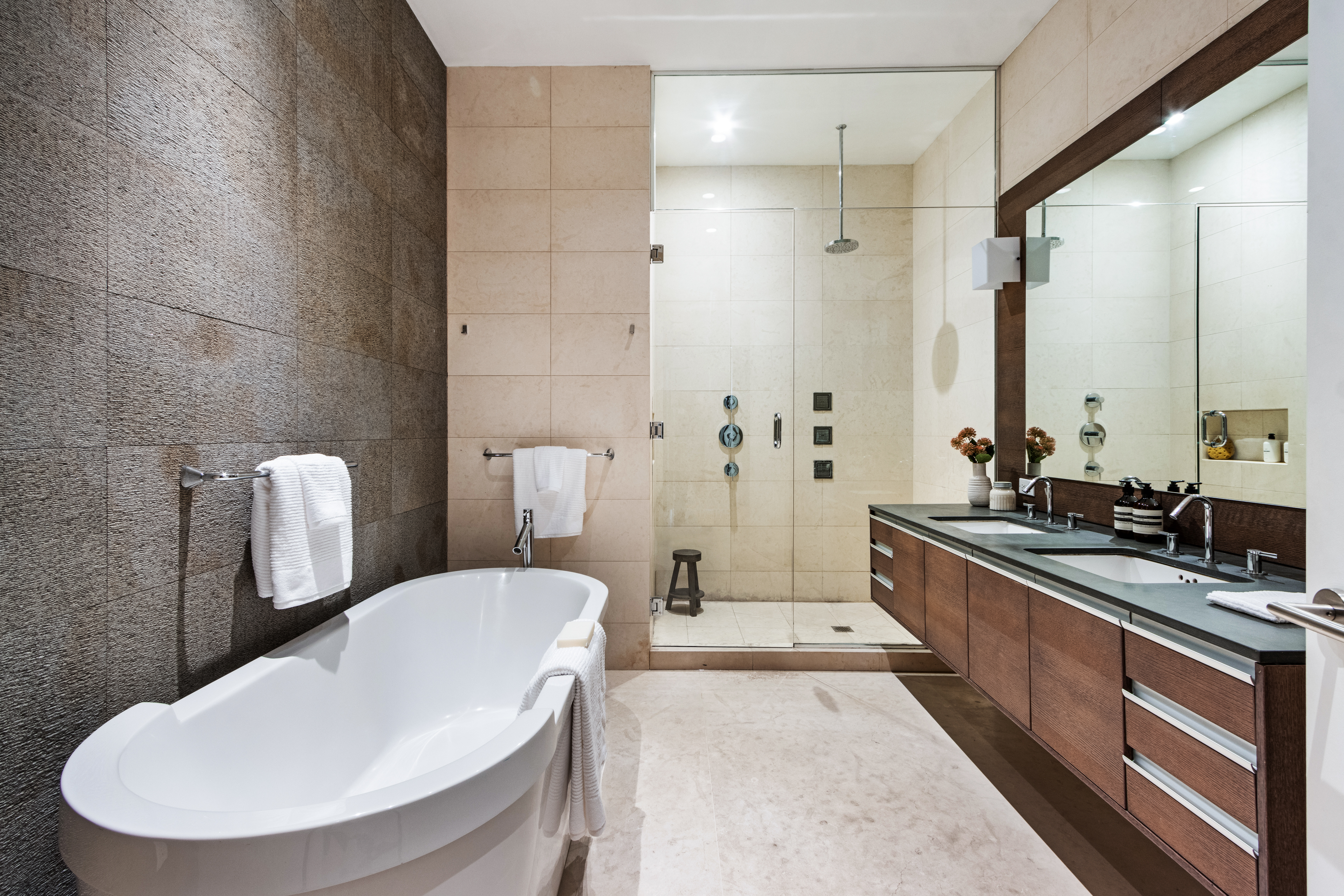 85 Leonard Street, Unit PH Manhattan, NY 10013 - Photo 13 of 27 a bathroom with a double vanity sink toilet and shower