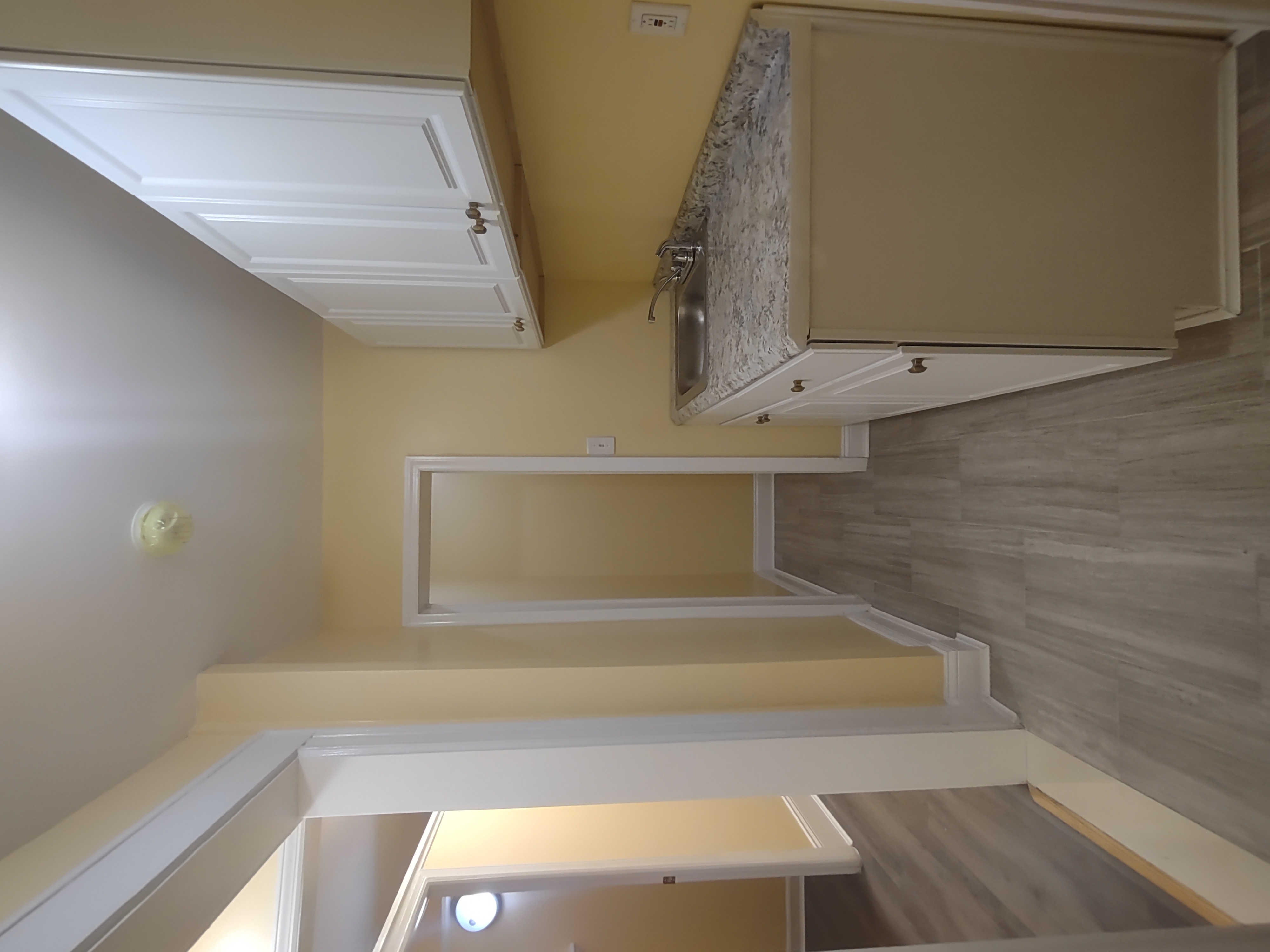 175 Fenimore Street Brooklyn, NY 11225 - Photo 8 of 11 a utility room with wooden floor washer and dryer