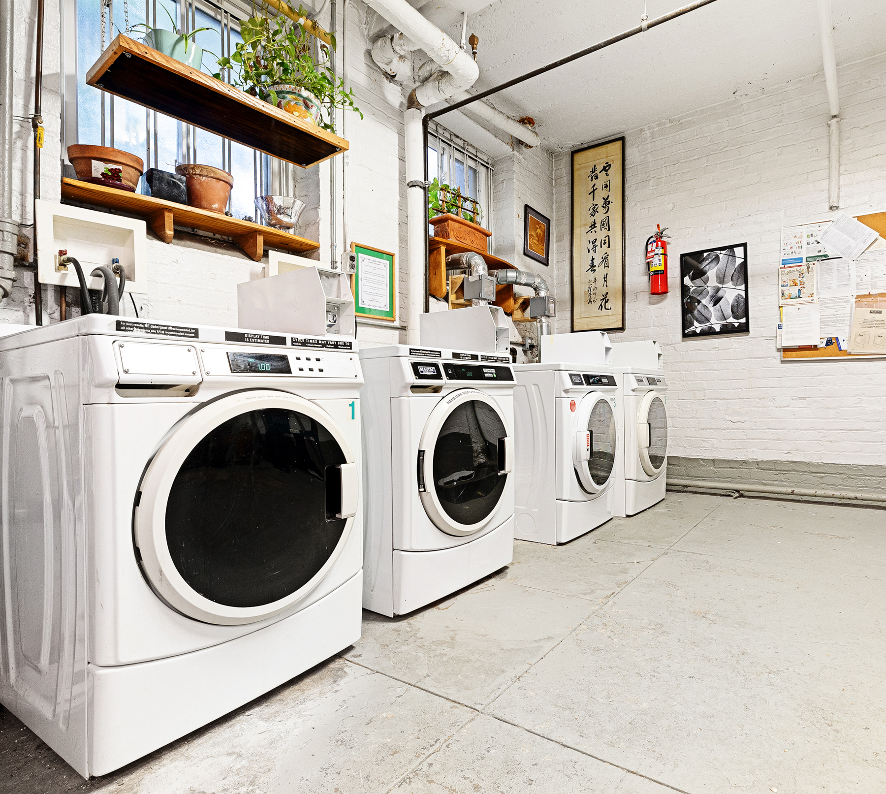 35-55 78th Street, Unit 1 Queens, NY 11372 - Photo 9 of 12 a utility room with dryer and washer