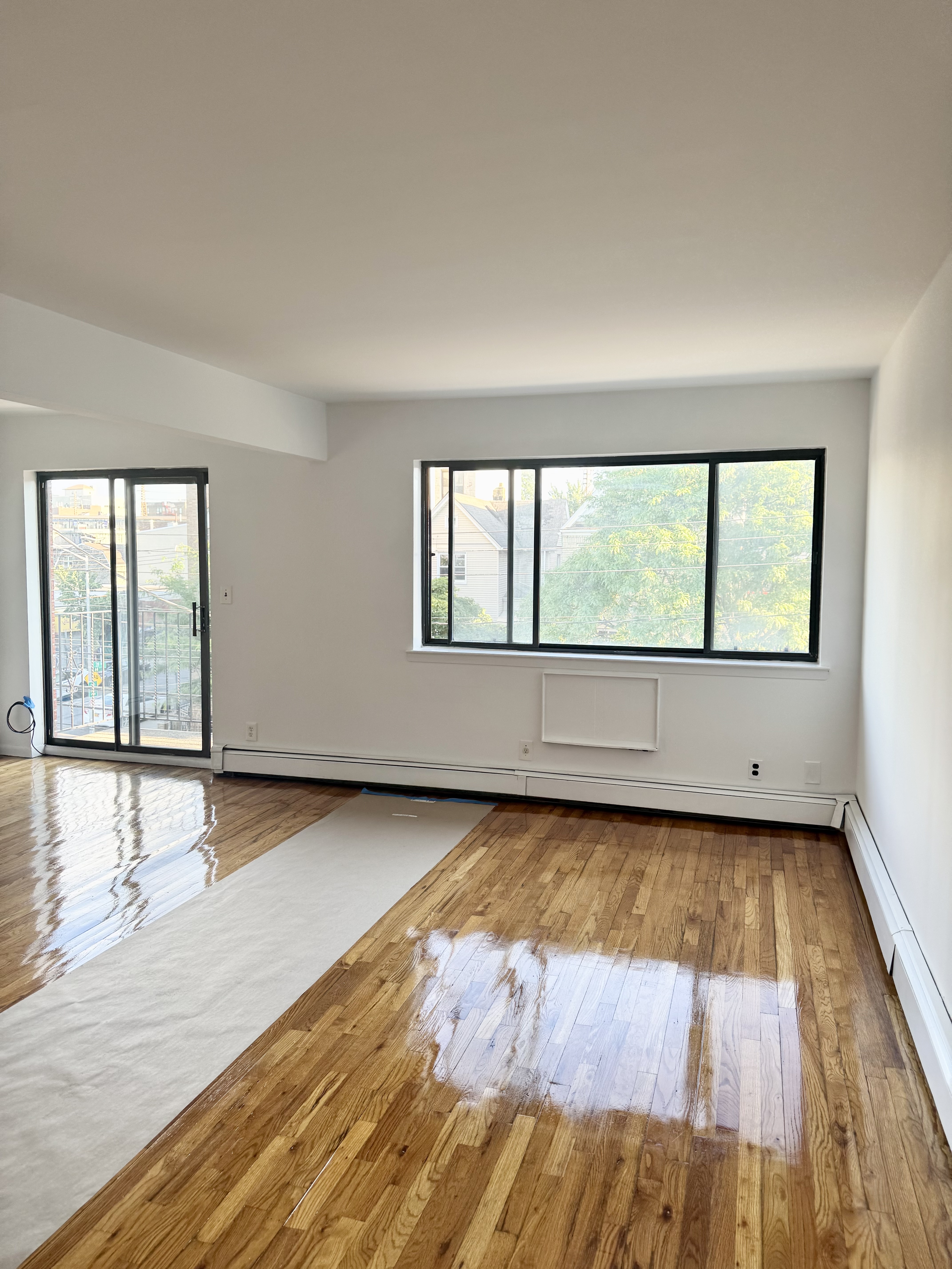 59-15 39th Avenue, Unit 3 Queens, NY 11377 - Photo 2 of 12