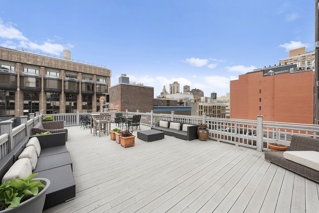 250 Mercer Street, Unit B203 Manhattan, NY 10012 - Photo 15 of 19 a view of roof deck with patio