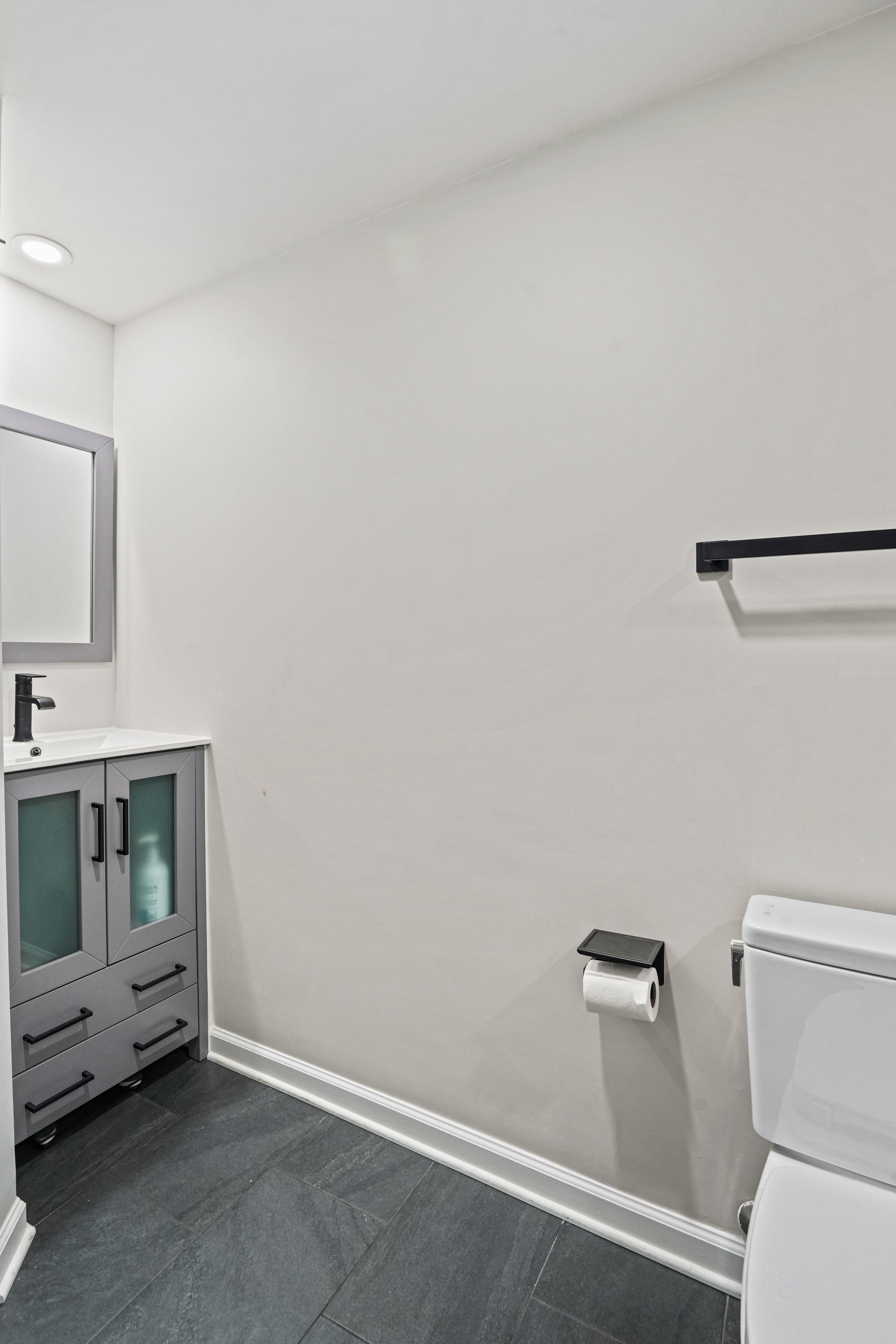 2725 Connecticut Avenue Northwest, Unit 507 Washington, DC 20008 - Photo 29 of 31 a bathroom with a toilet and a sink