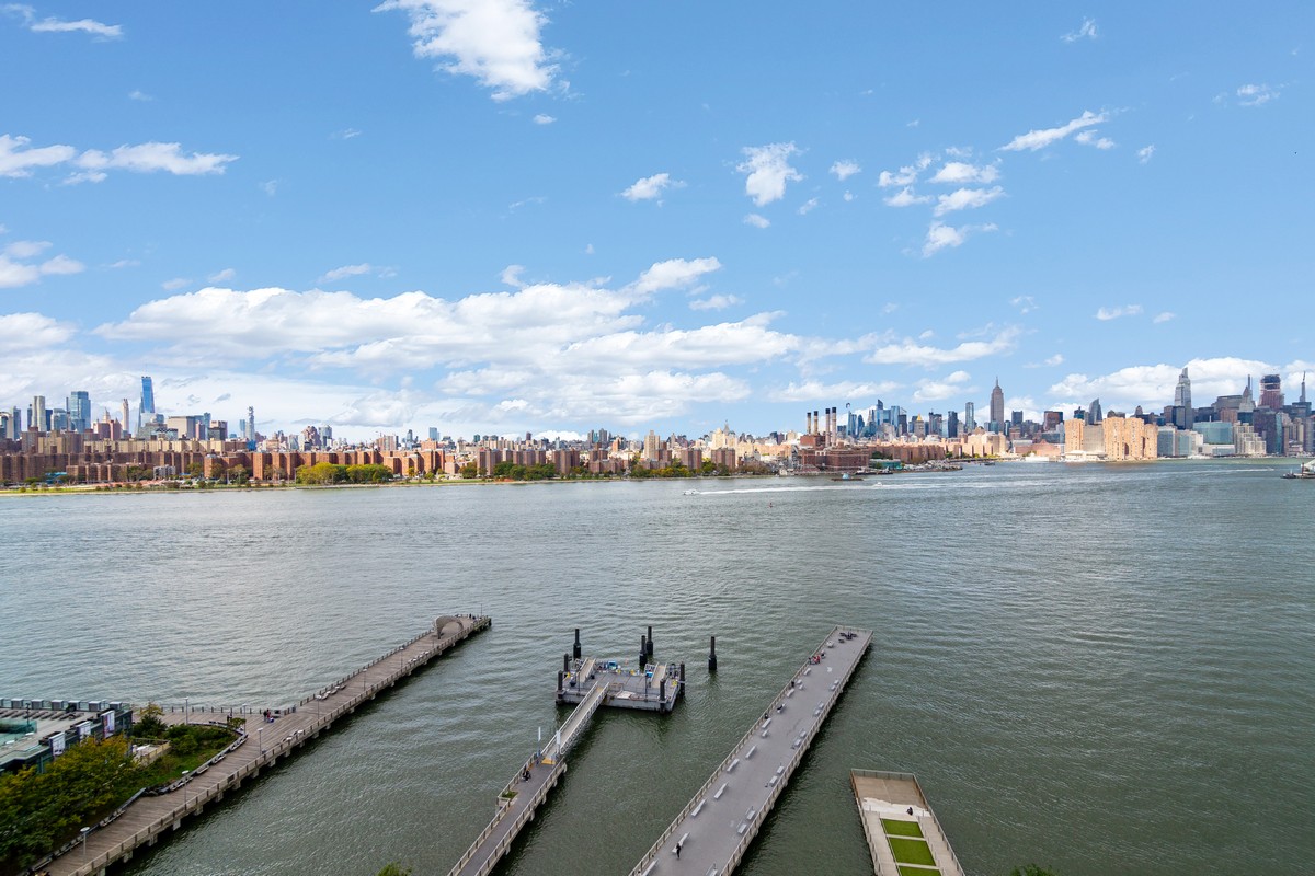 22 North 6th Street, Unit 18D Brooklyn, NY 11249 - Photo 8 of 9 a view of a lake and city