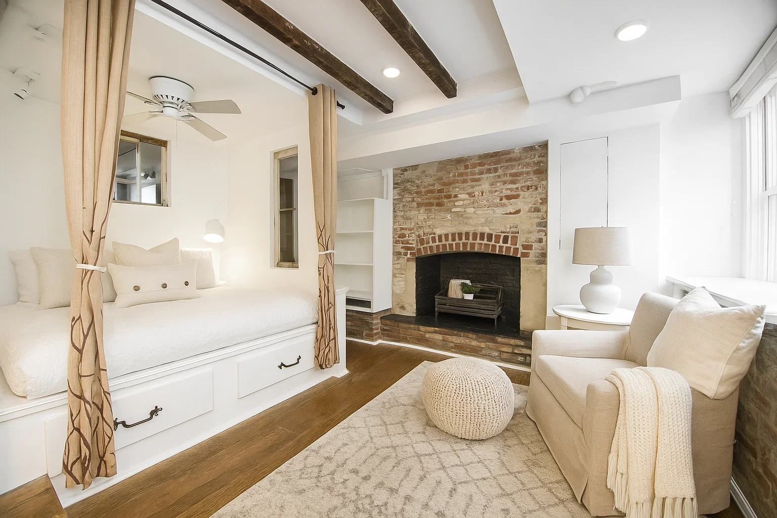 113 1/2 West 15th Street, Unit 1W Manhattan, NY 10011 - Photo 1 of 12 a living room with furniture and a fireplace