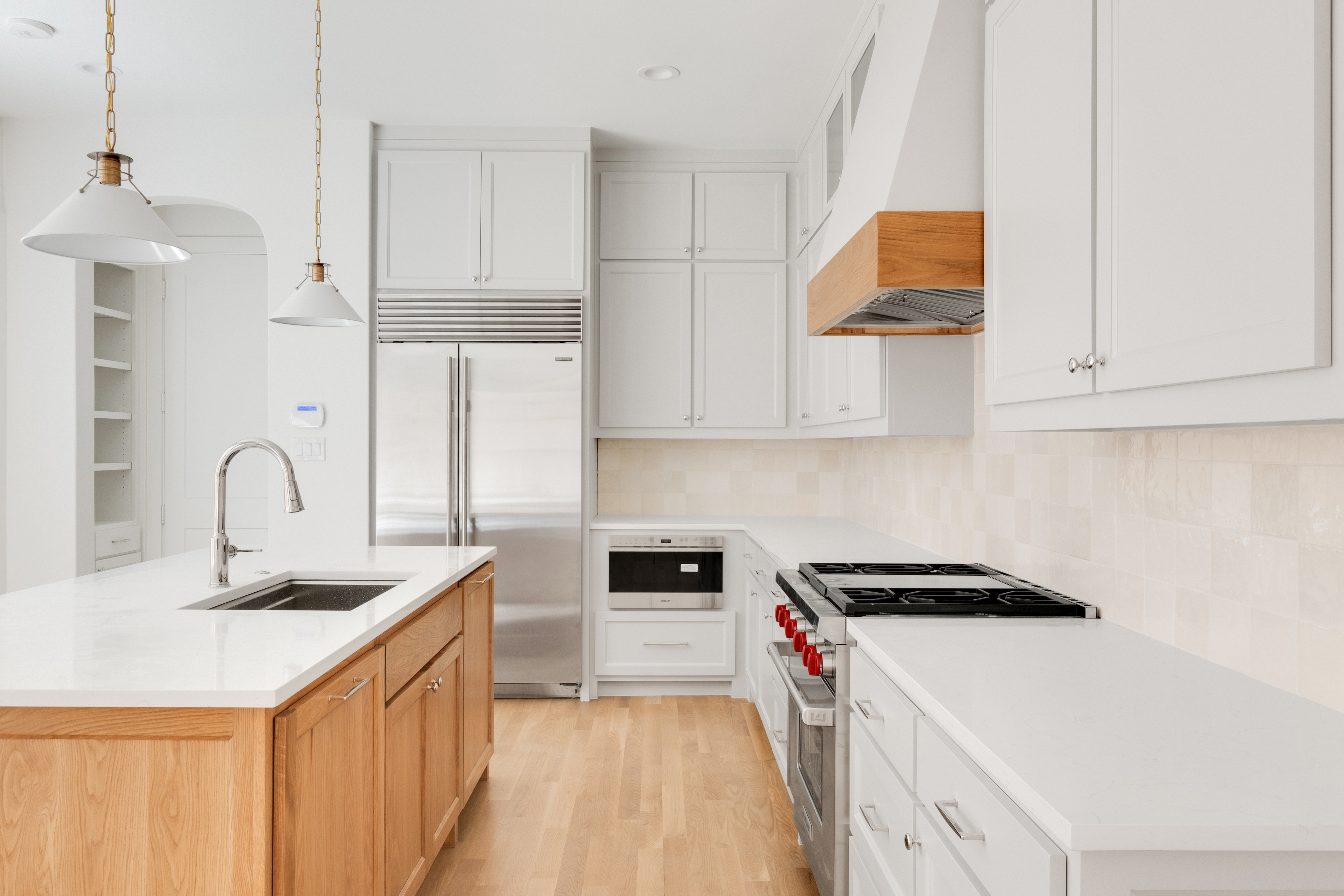 4410 Glenwick Lane Dallas, TX 75205 - Photo 6 of 28 a kitchen that has a sink and a stove