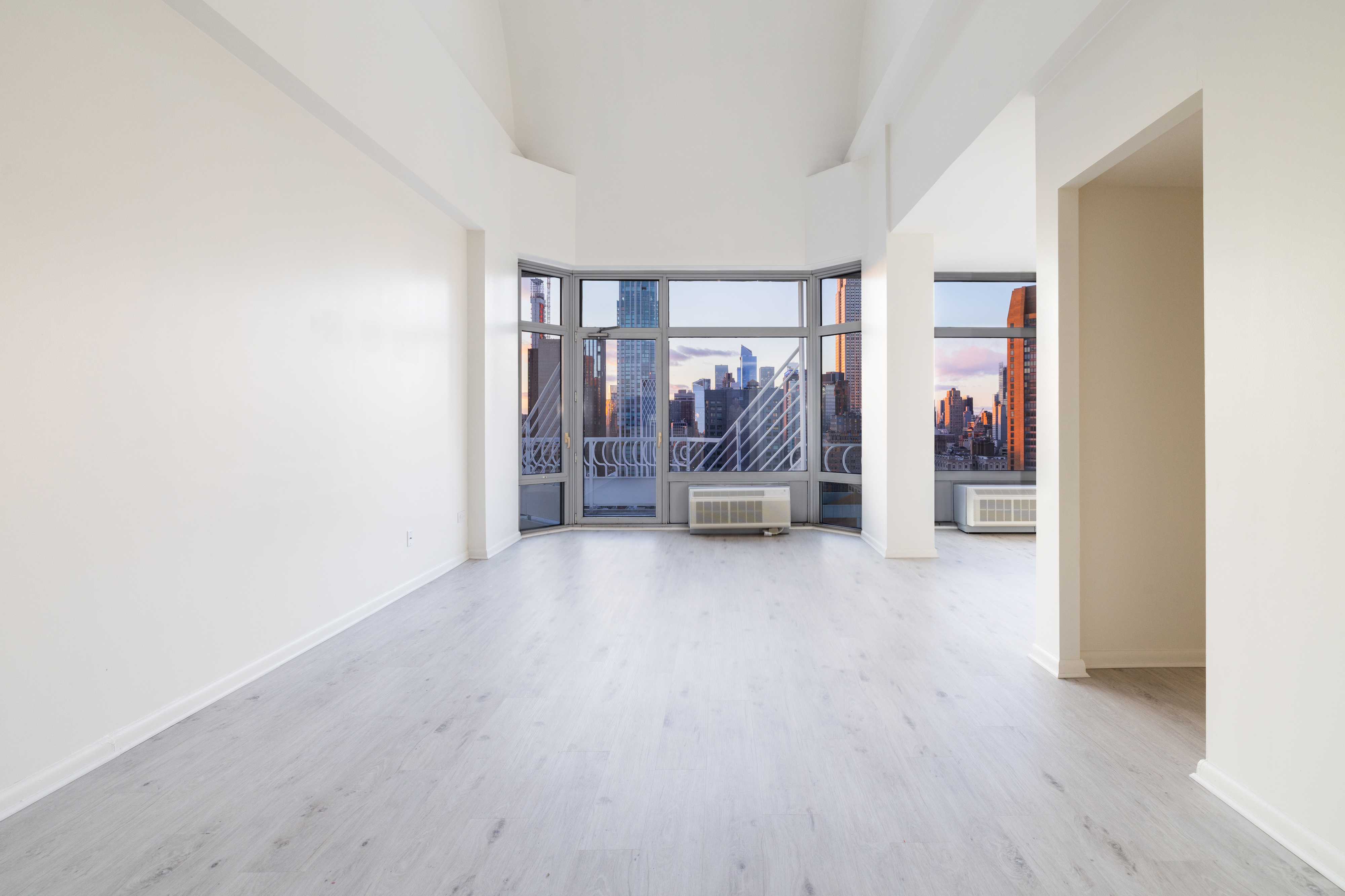 200 East 32nd Street, Unit 35C Manhattan, NY 10016 - Photo 5 of 26 a view of empty room with wooden floor