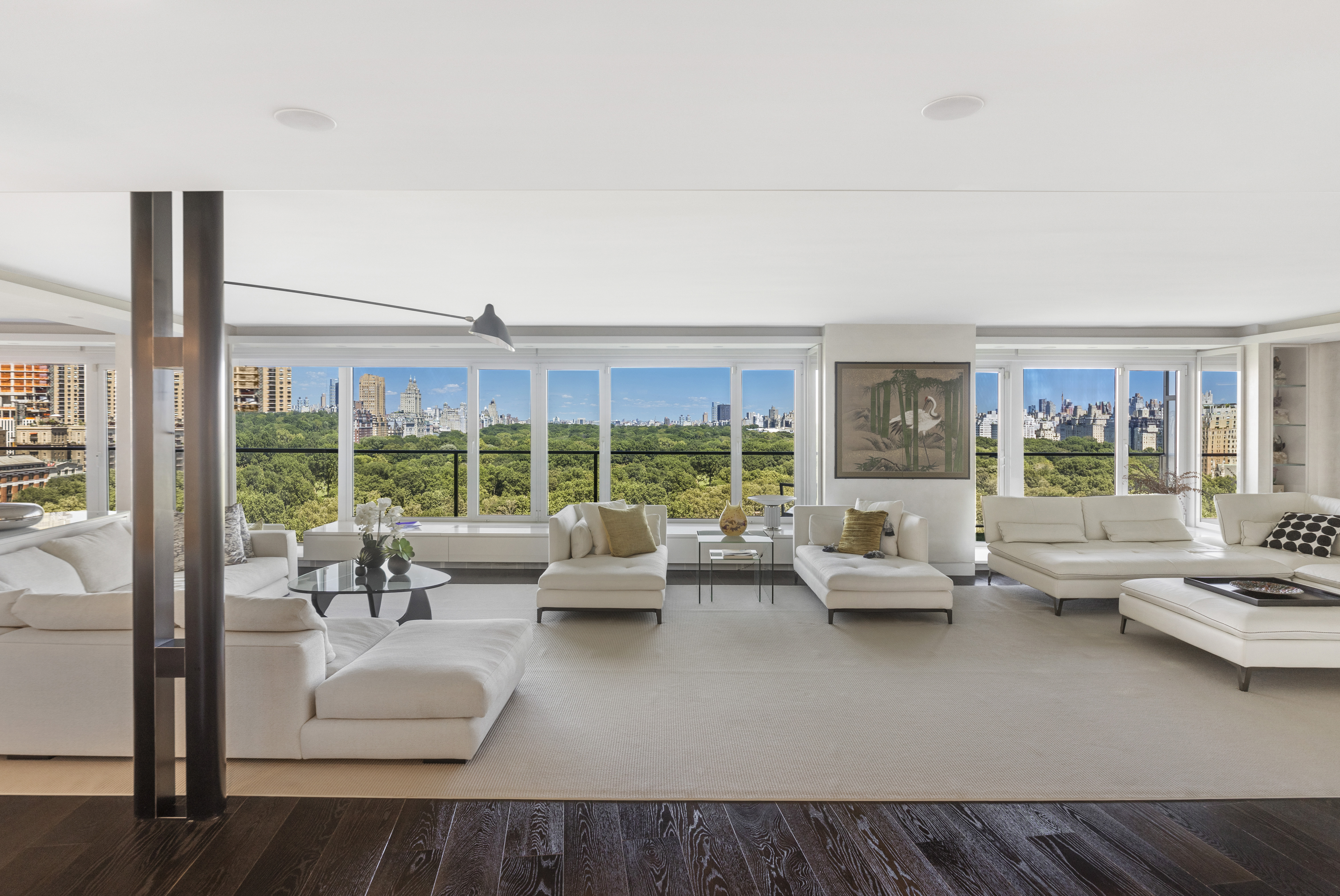 200 Central Park South, Unit 20DEF Manhattan, NY 10019 - Photo 1 of 16 a living room with furniture and a large window
