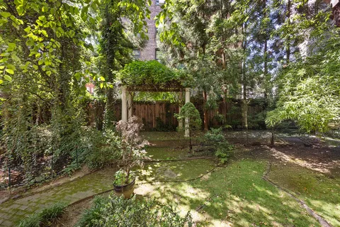 a backyard of a house with lots of green space