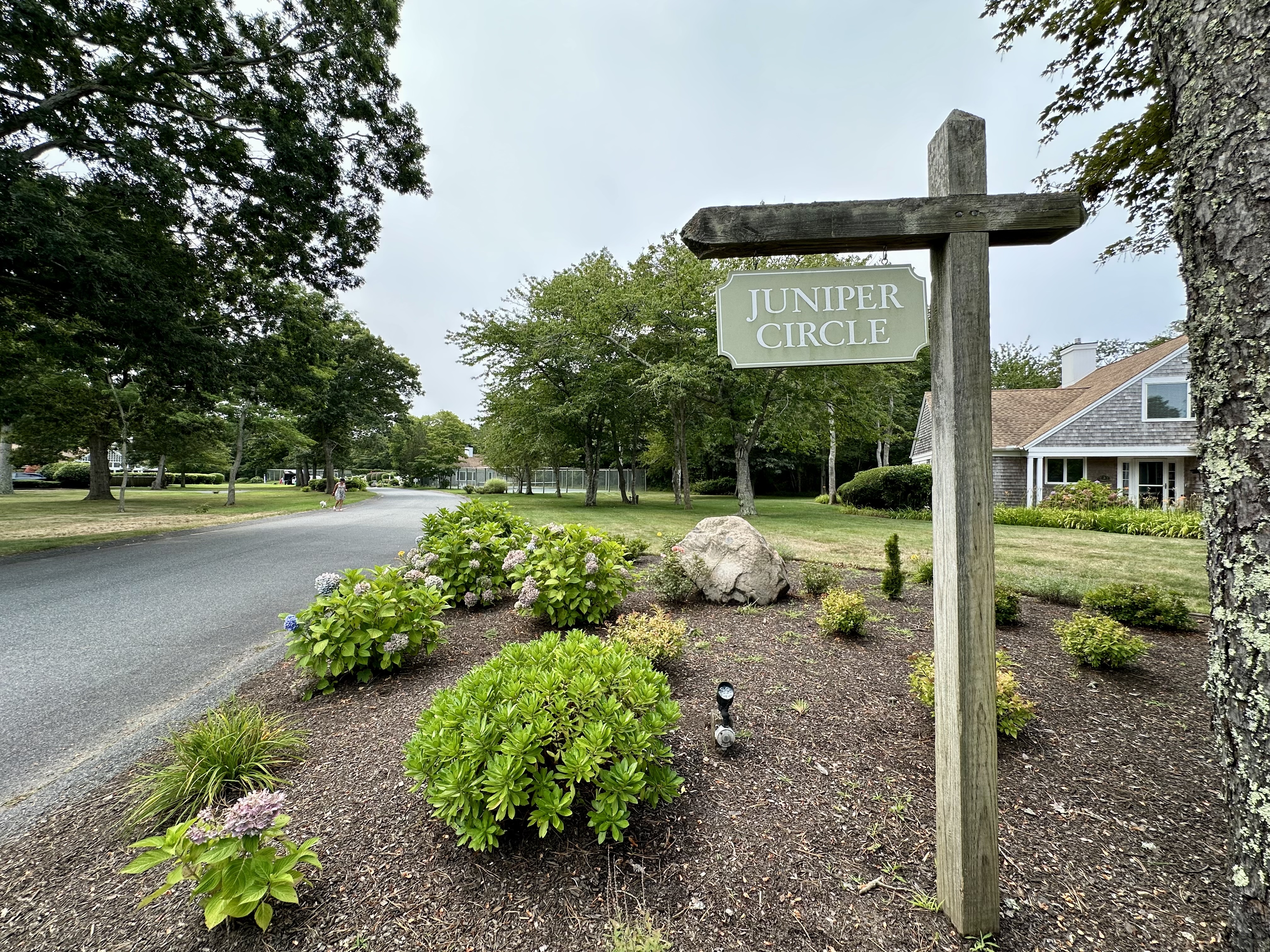 11 Juniper Circle Brewster, MA 02631 - Photo 29 of 29 a front view of a house with garden