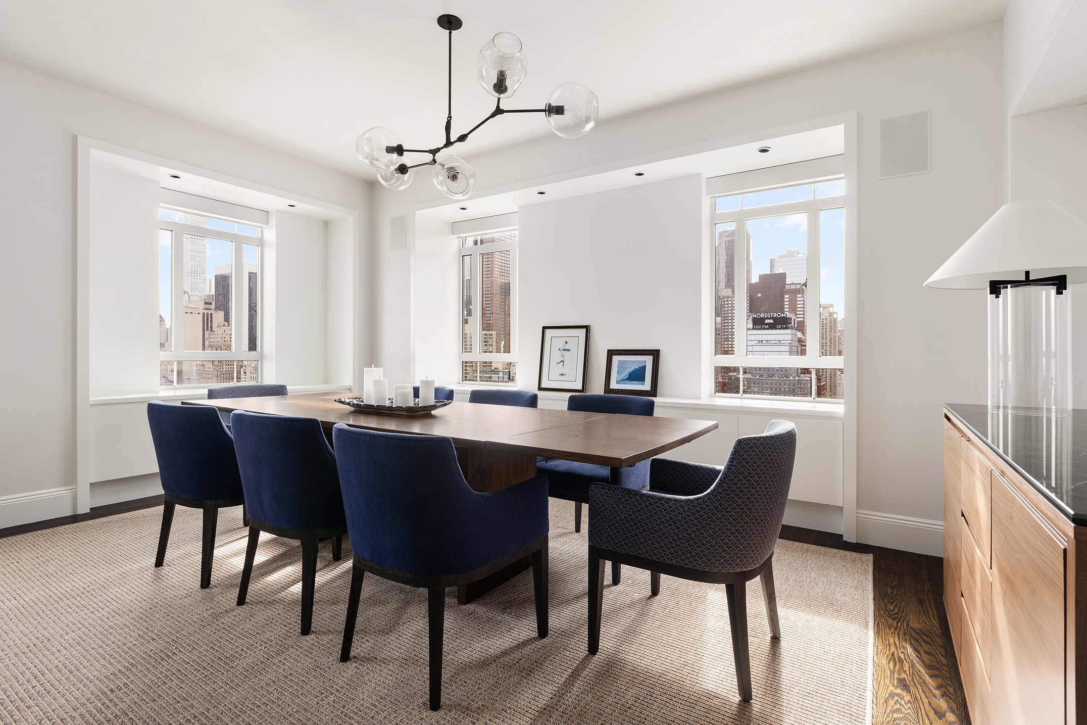 25 Central Park West, Unit 27J Manhattan, NY 10023 - Photo 5 of 13 a view of a dining room with furniture and window