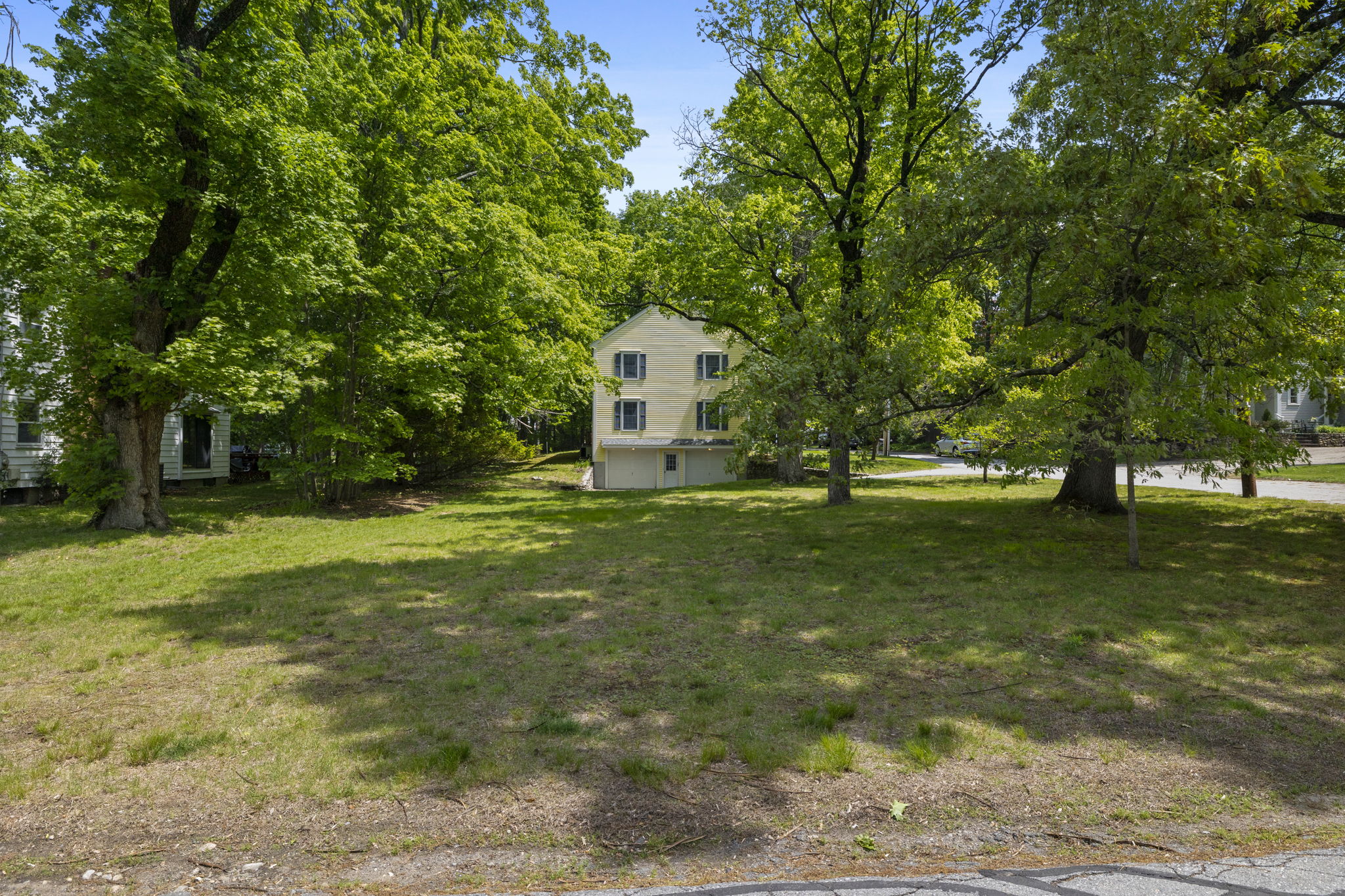 2 Laurel Street Lexington, MA 02421 - Photo 43 of 46 a front view of a house with a yard