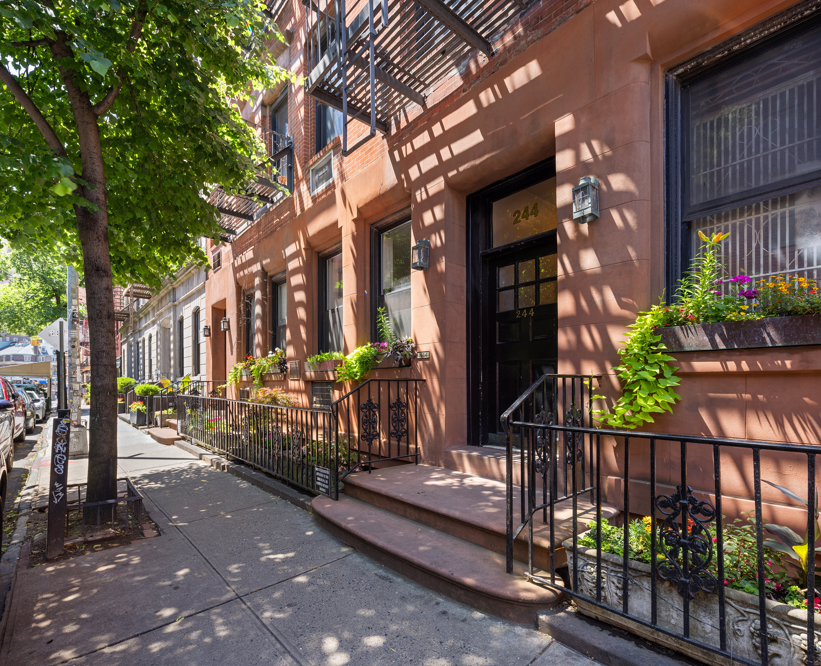 244 West 4th Street, Unit 5D Manhattan, NY 10014 - Photo 5 of 7 a view of street with sitting area