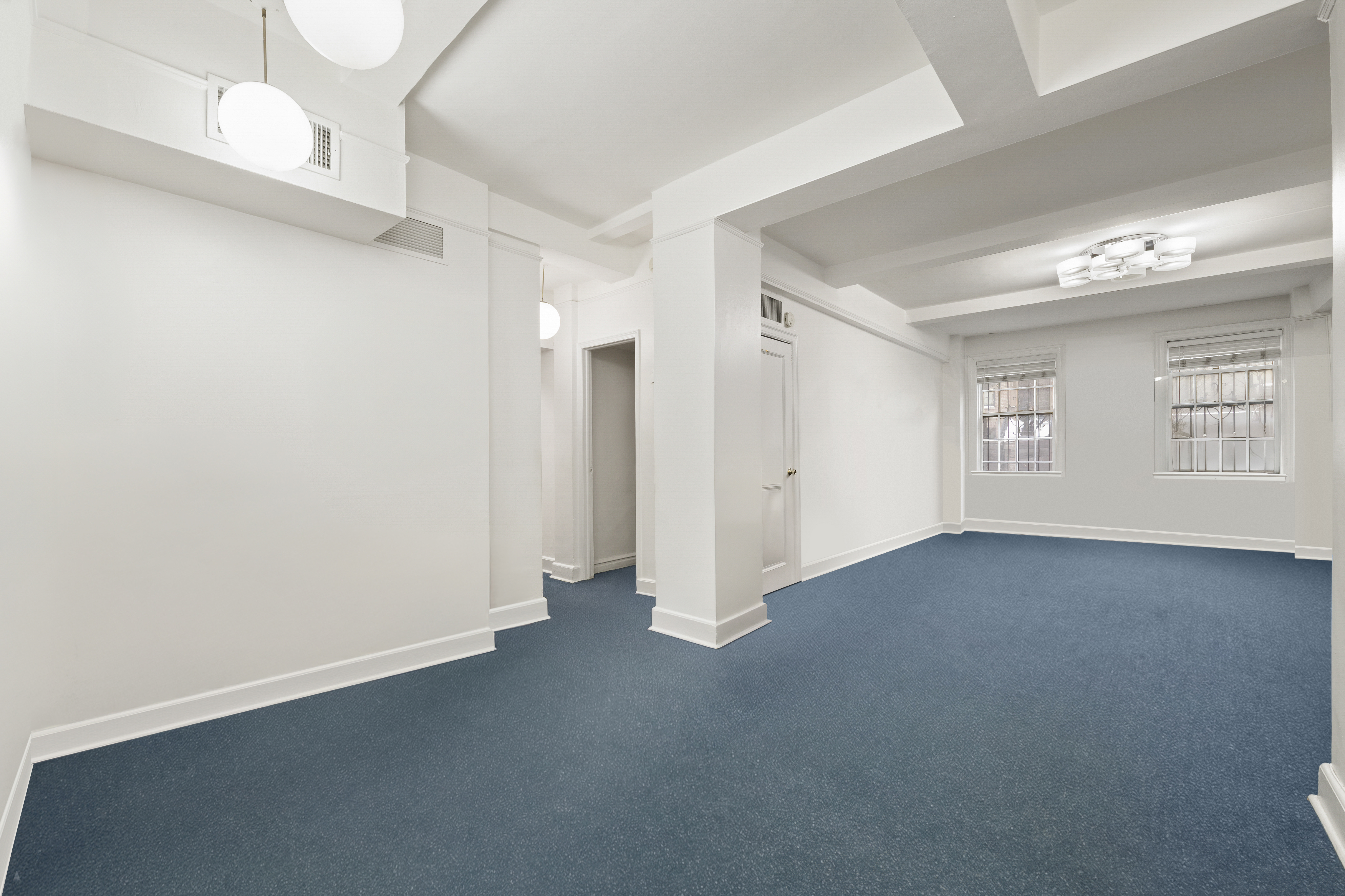 162 East 80th Street, Unit 1B Manhattan, NY 10075 - Photo 3 of 10 a view of an empty room with a window
