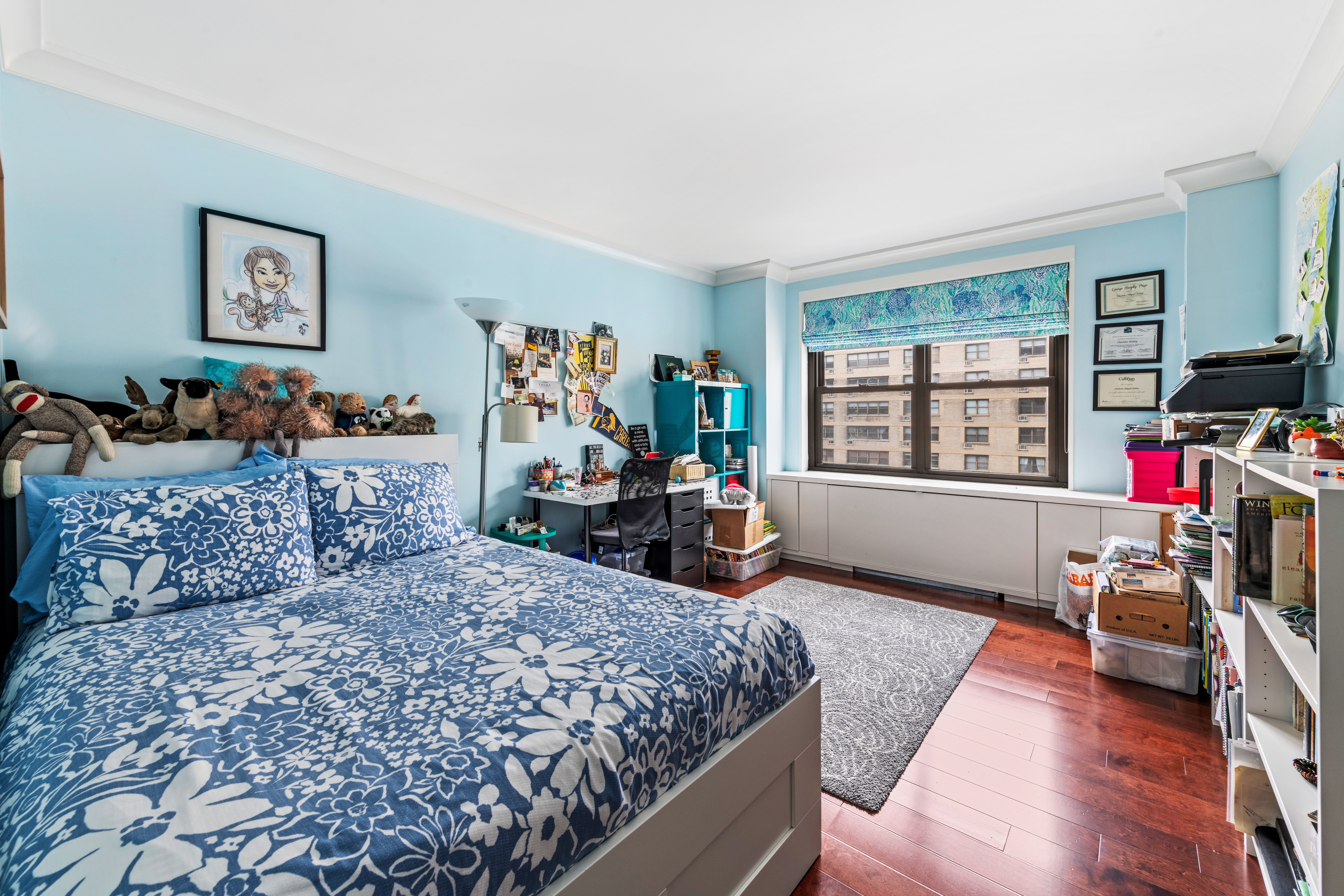 180 West End Avenue, Unit 25M Manhattan, NY 10023 - Photo 7 of 11 a bed room with furniture and a wooden floor