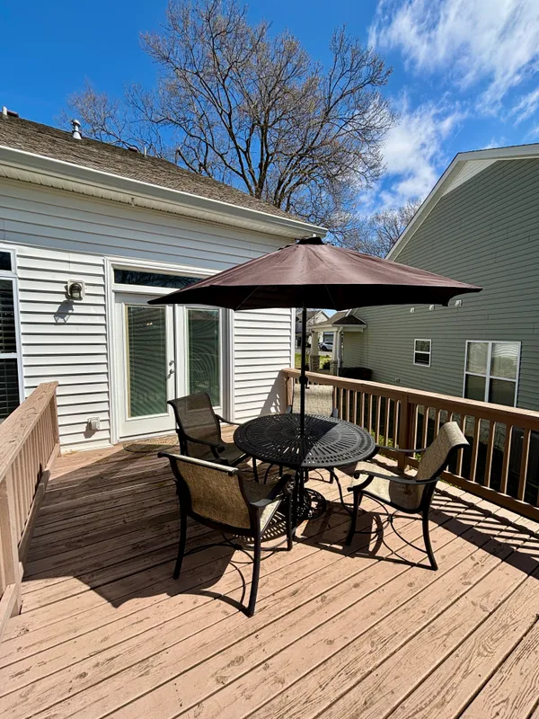 a view of a chairs on the deck