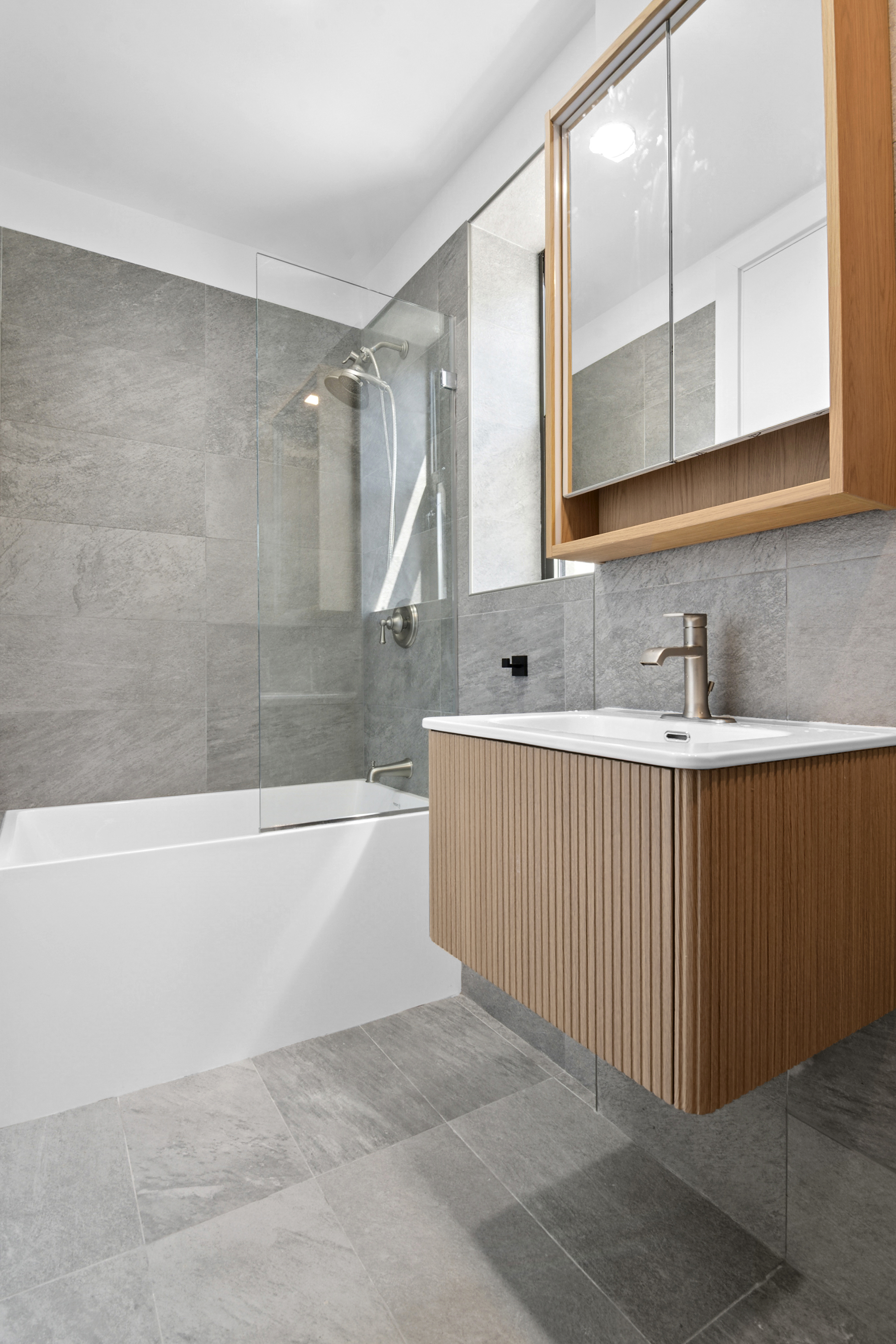 110 Butler Street, Unit 2 Brooklyn, NY 11231 - Photo 6 of 9 a bathroom with a bathtub and a sink