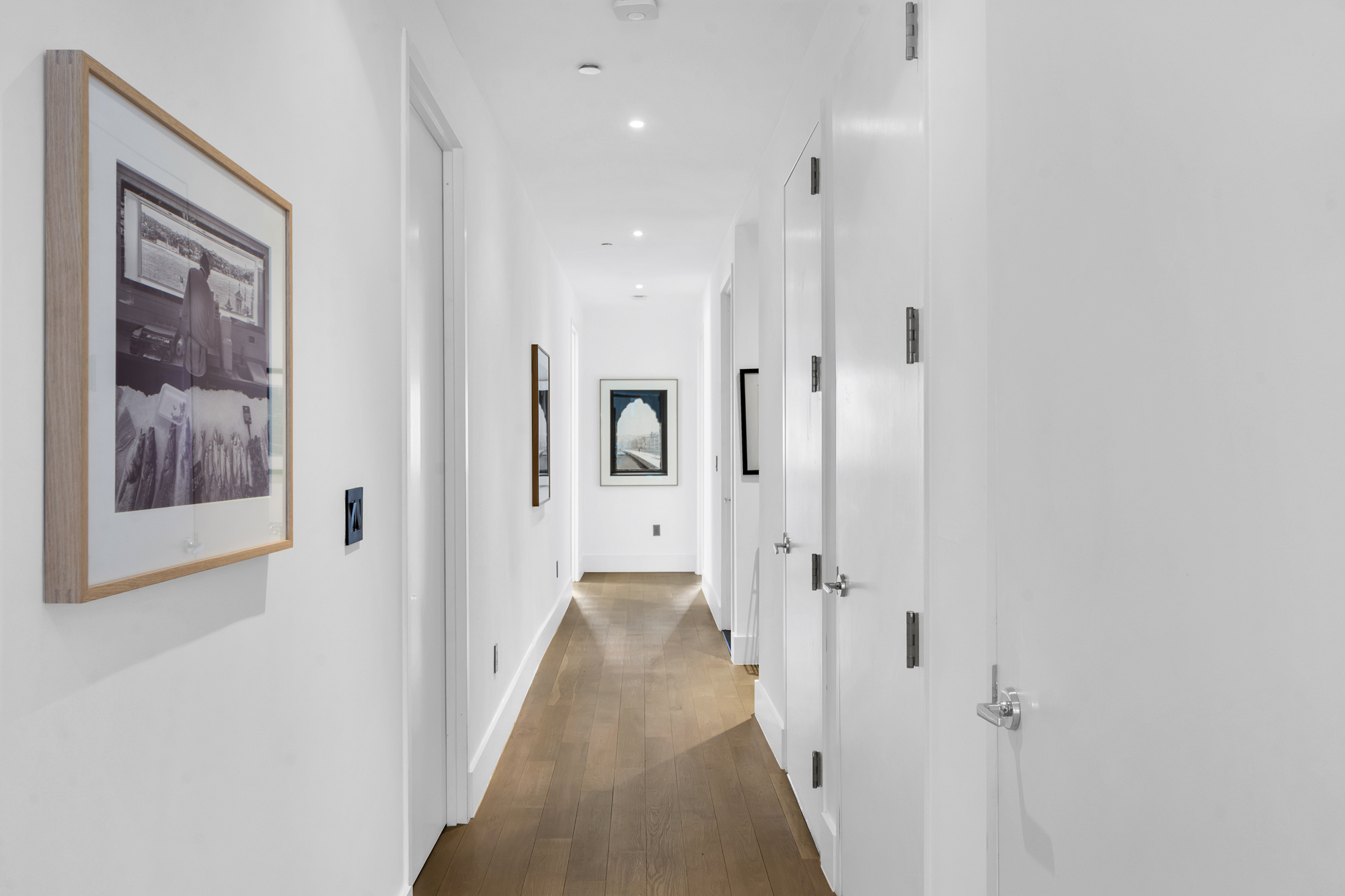 267 West 124th Street, Unit 6A Manhattan, NY 10027 - Photo 12 of 24 a view of a hallway with wooden floor and closet
