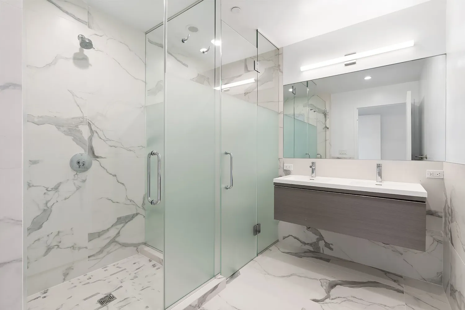 a bathroom with a sink and mirror