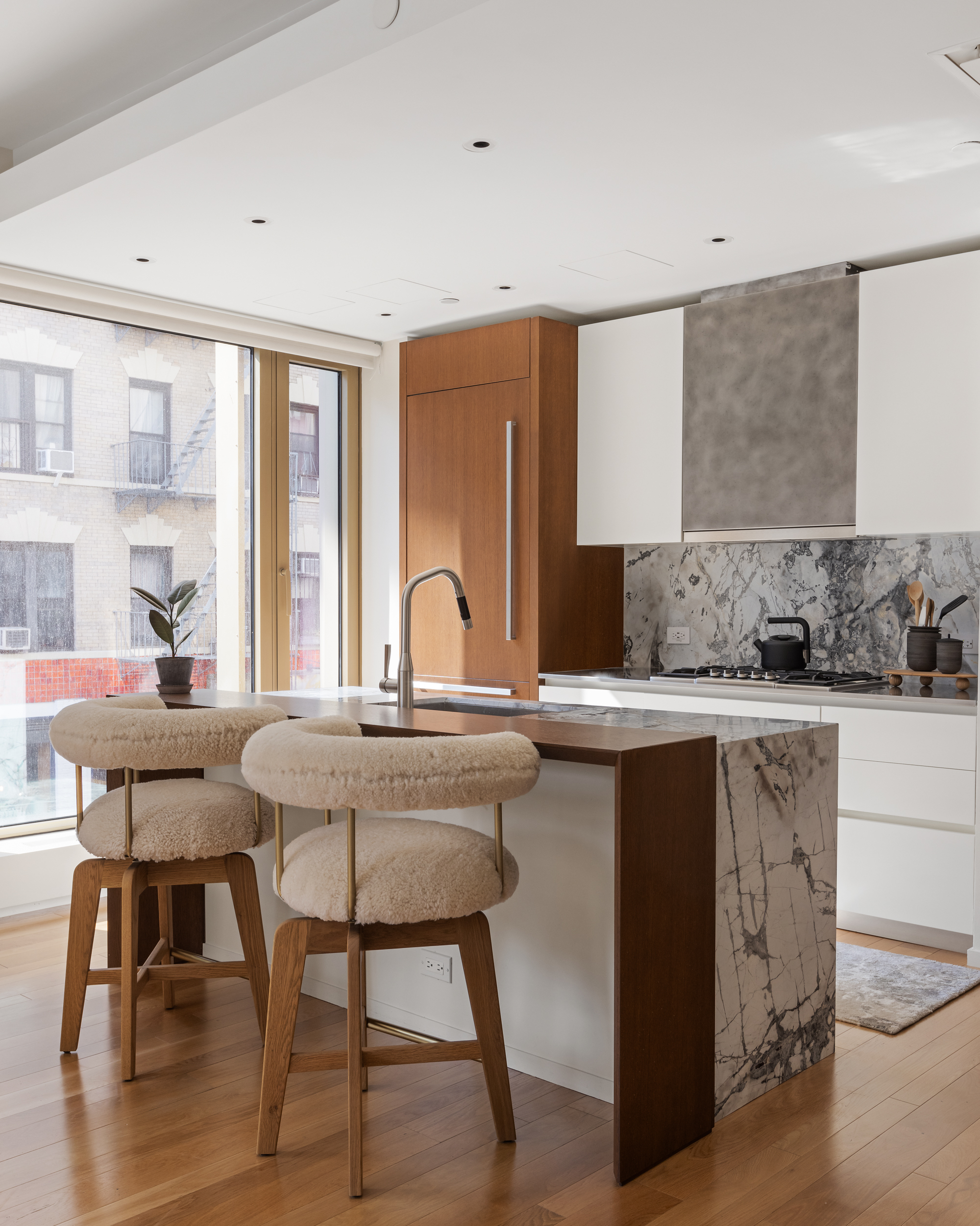 75 Kenmare Street, Unit 2D Manhattan, NY 10012 - Photo 8 of 15 a view of a a dining room with furniture window and wooden floor