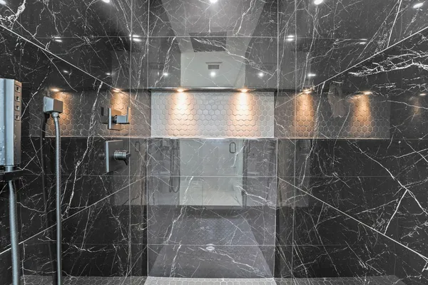 a bathroom with a sink and a shower