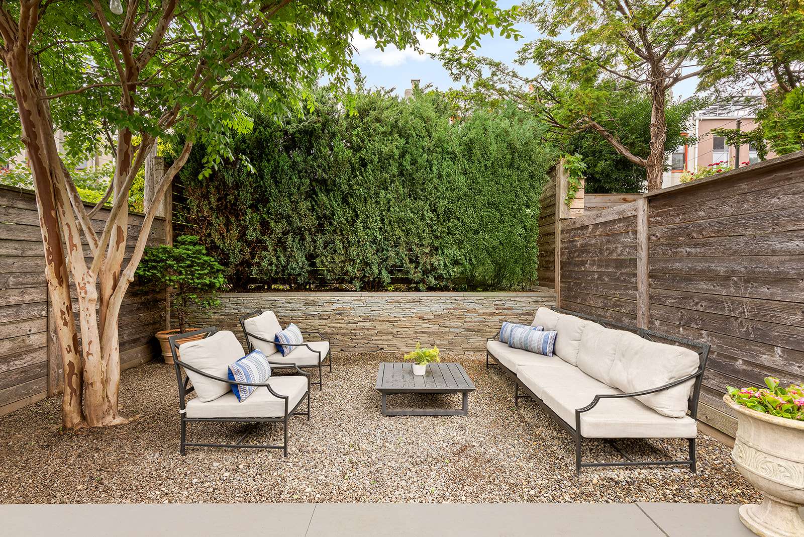 203 Lefferts Avenue Brooklyn, NY 11225 - Photo 7 of 12 a view of a backyard with furniture