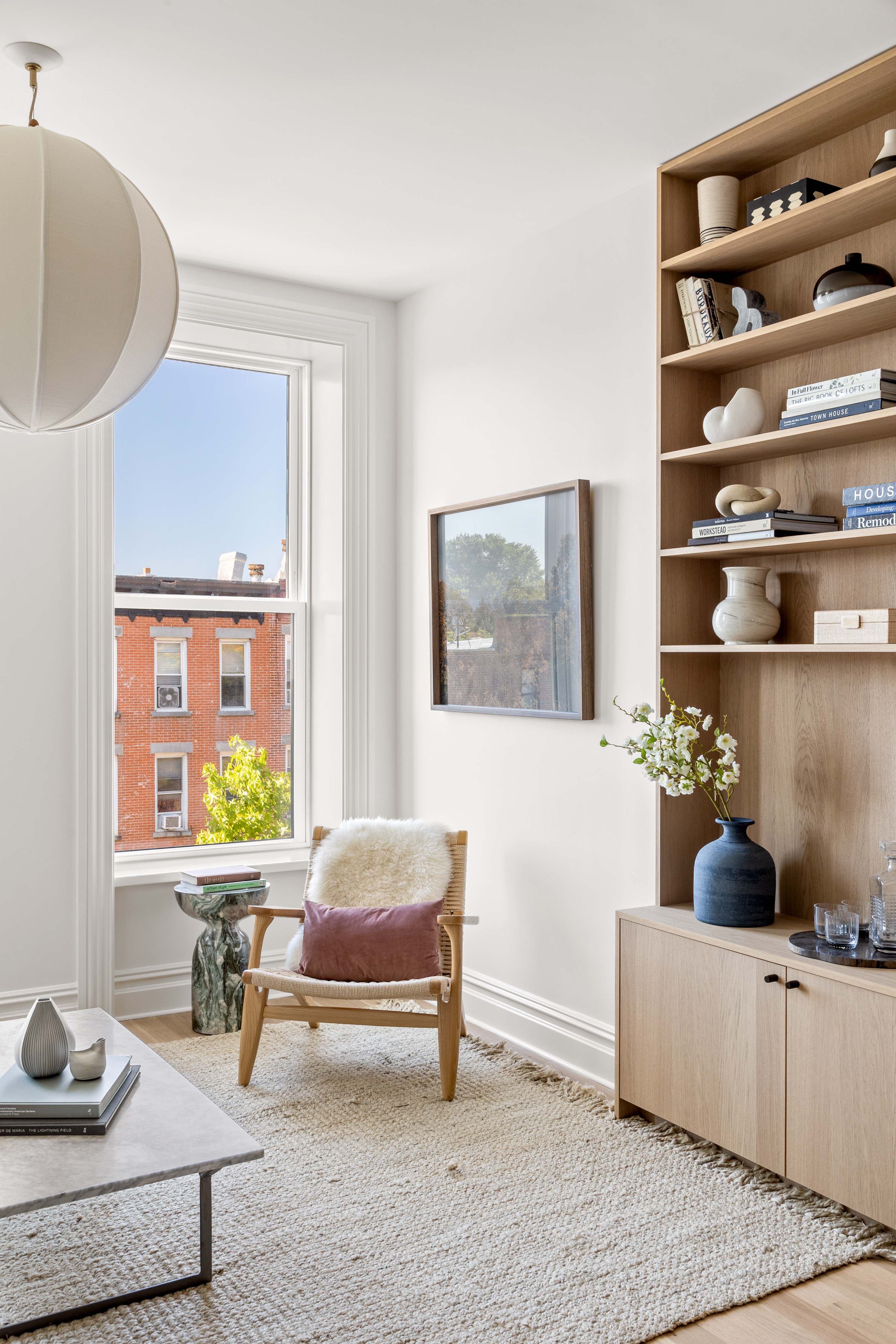 489 7th Avenue, Unit 3 Brooklyn, NY 11215 - Photo 10 of 11 a living room with furniture and a potted plant