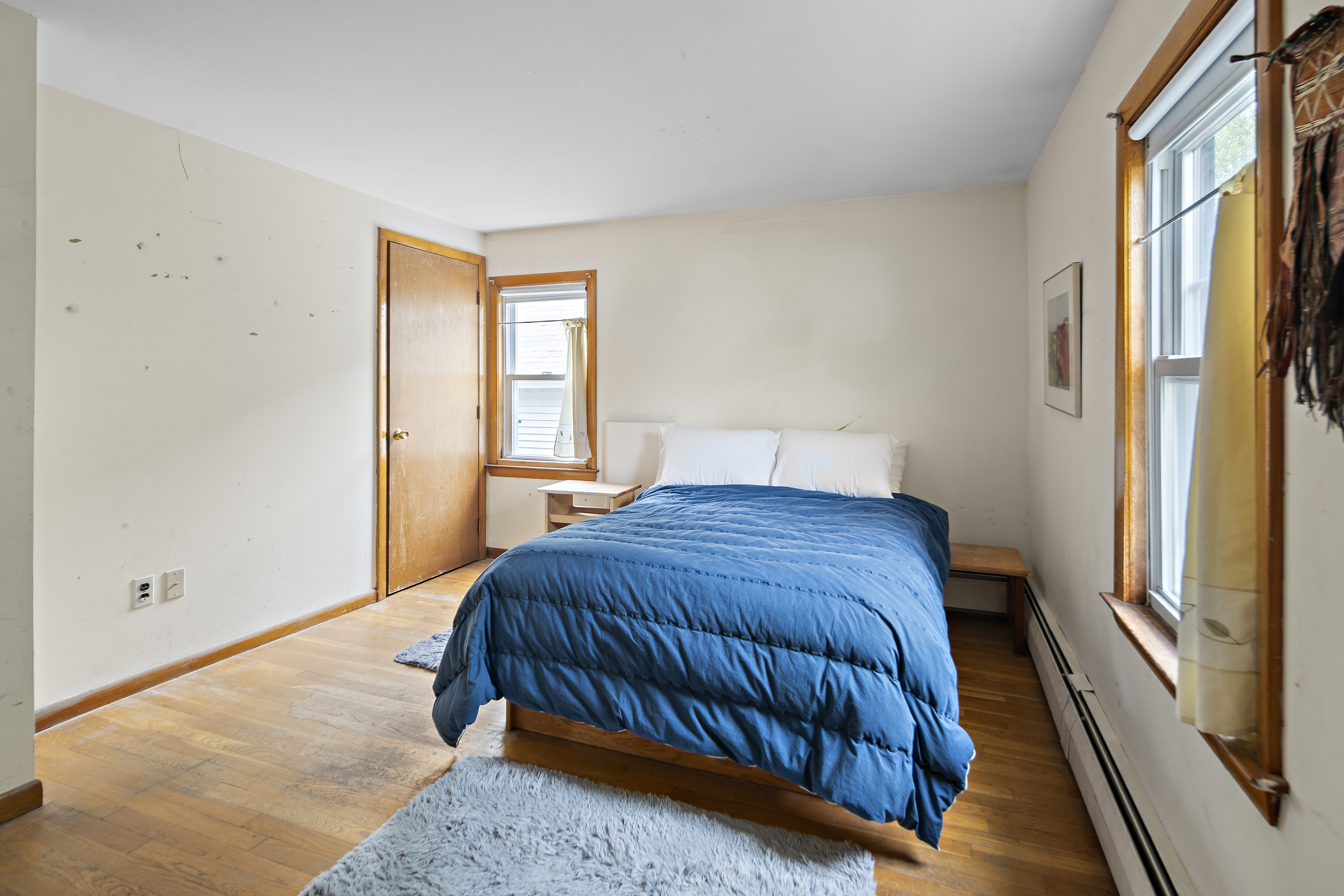 15 Harrington Road Cambridge, MA 02140 - Photo 6 of 17 a bedroom with a bed and window