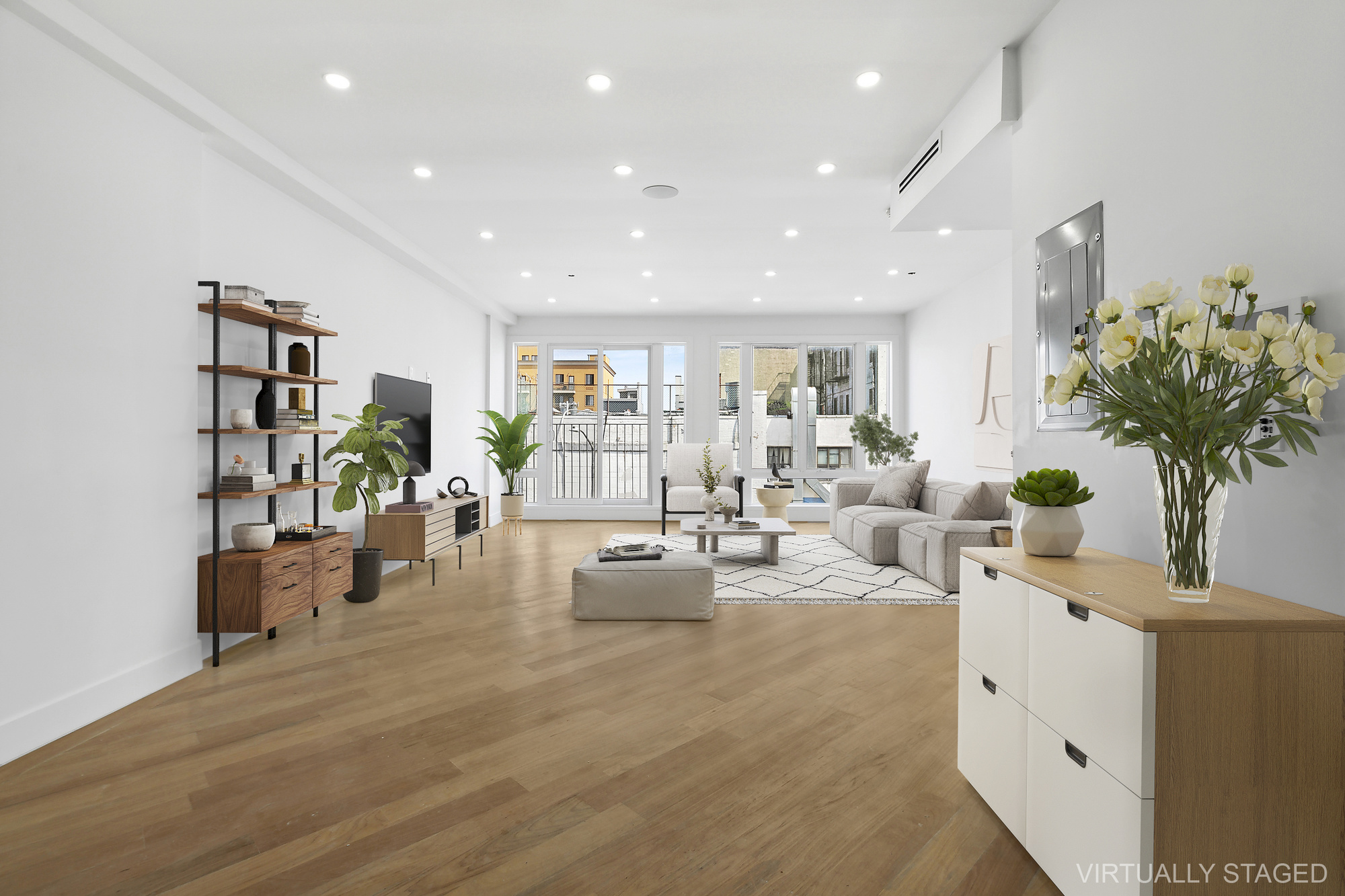 483 Hart Street, Unit 2 Brooklyn, NY 11221 - Photo 3 of 17 a living room with furniture and a book shelf
