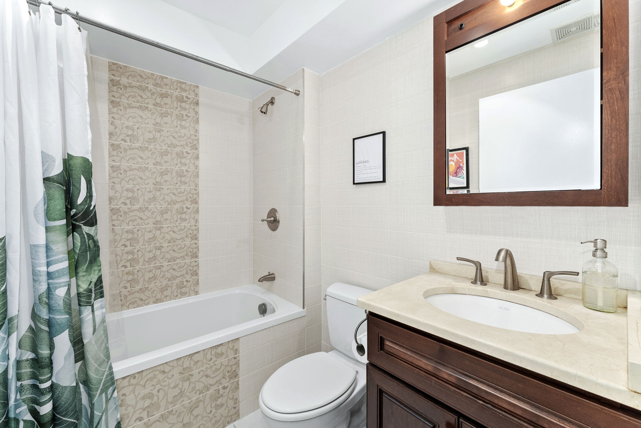 54 State Street, Unit 5 Brooklyn, NY 11201 - Photo 8 of 9 a bathroom with a granite countertop sink toilet a mirror a bathtub and shower