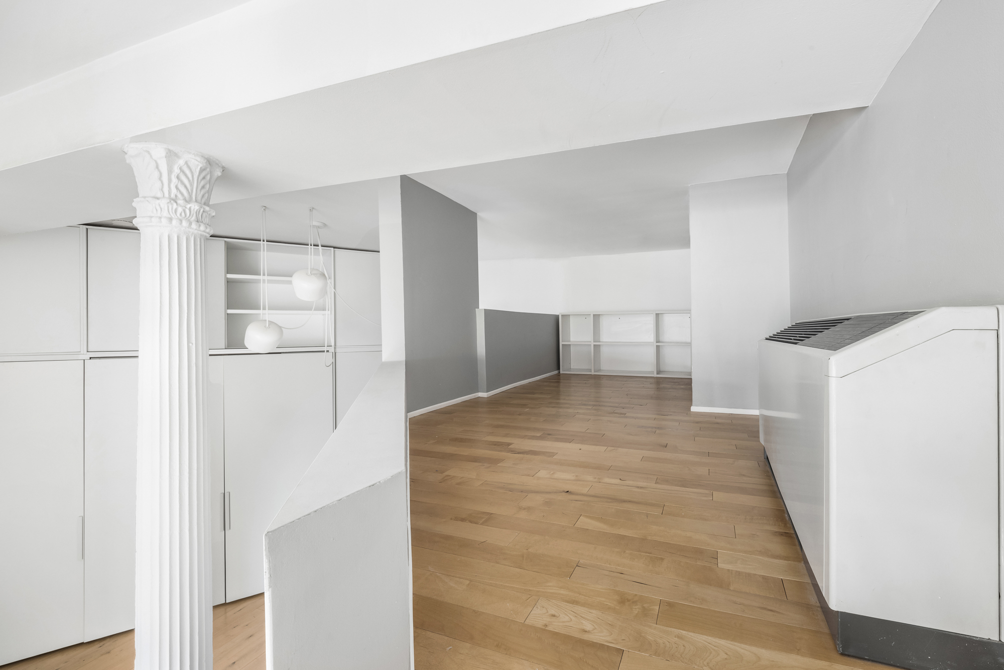 77 Bleecker Street, Unit 617 Manhattan, NY 10012 - Photo 8 of 13 a view of empty room with wooden floor