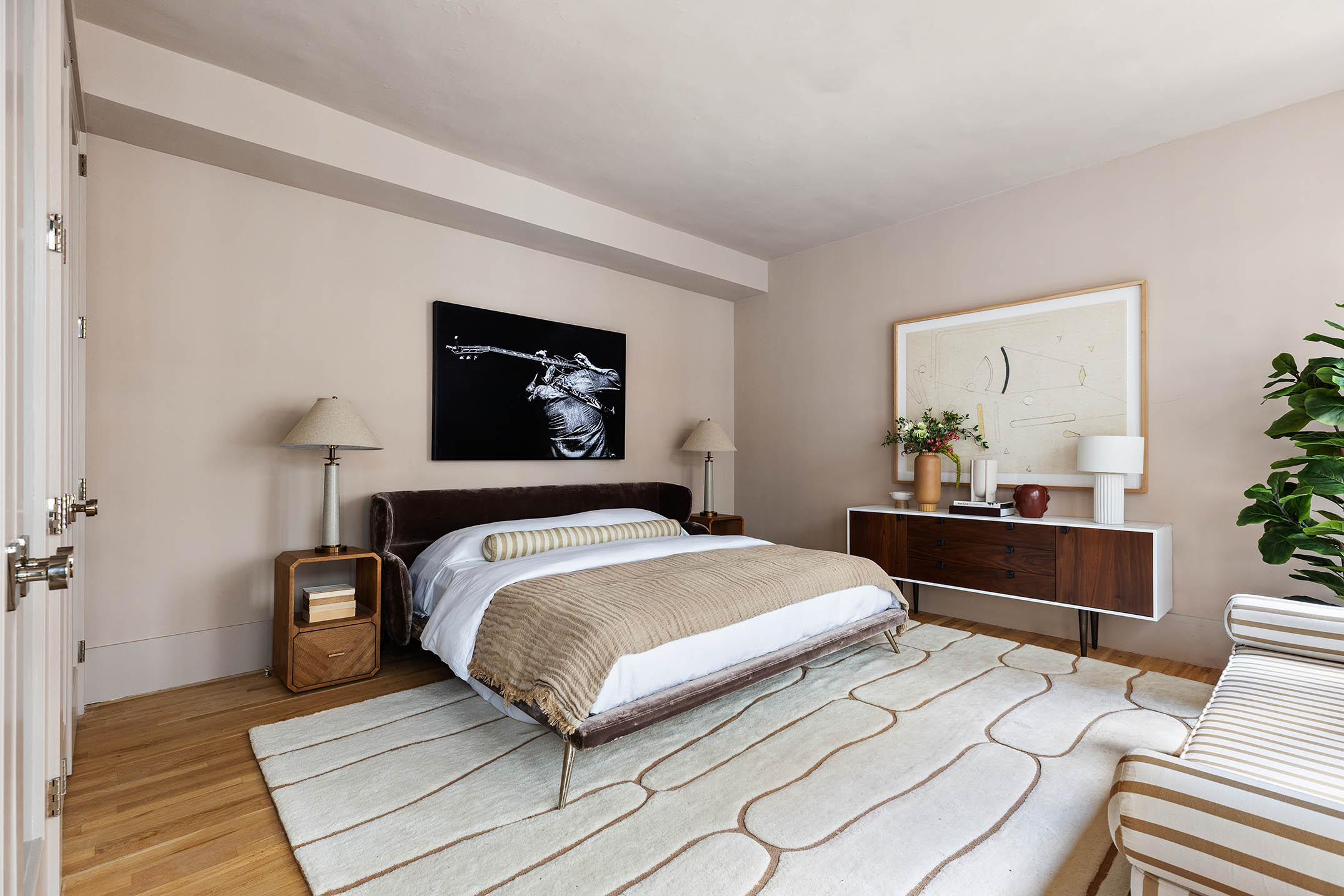260 West Broadway, Unit 4C Manhattan, NY 10013 - Photo 13 of 28 a bedroom with a bed and a painting on the wall