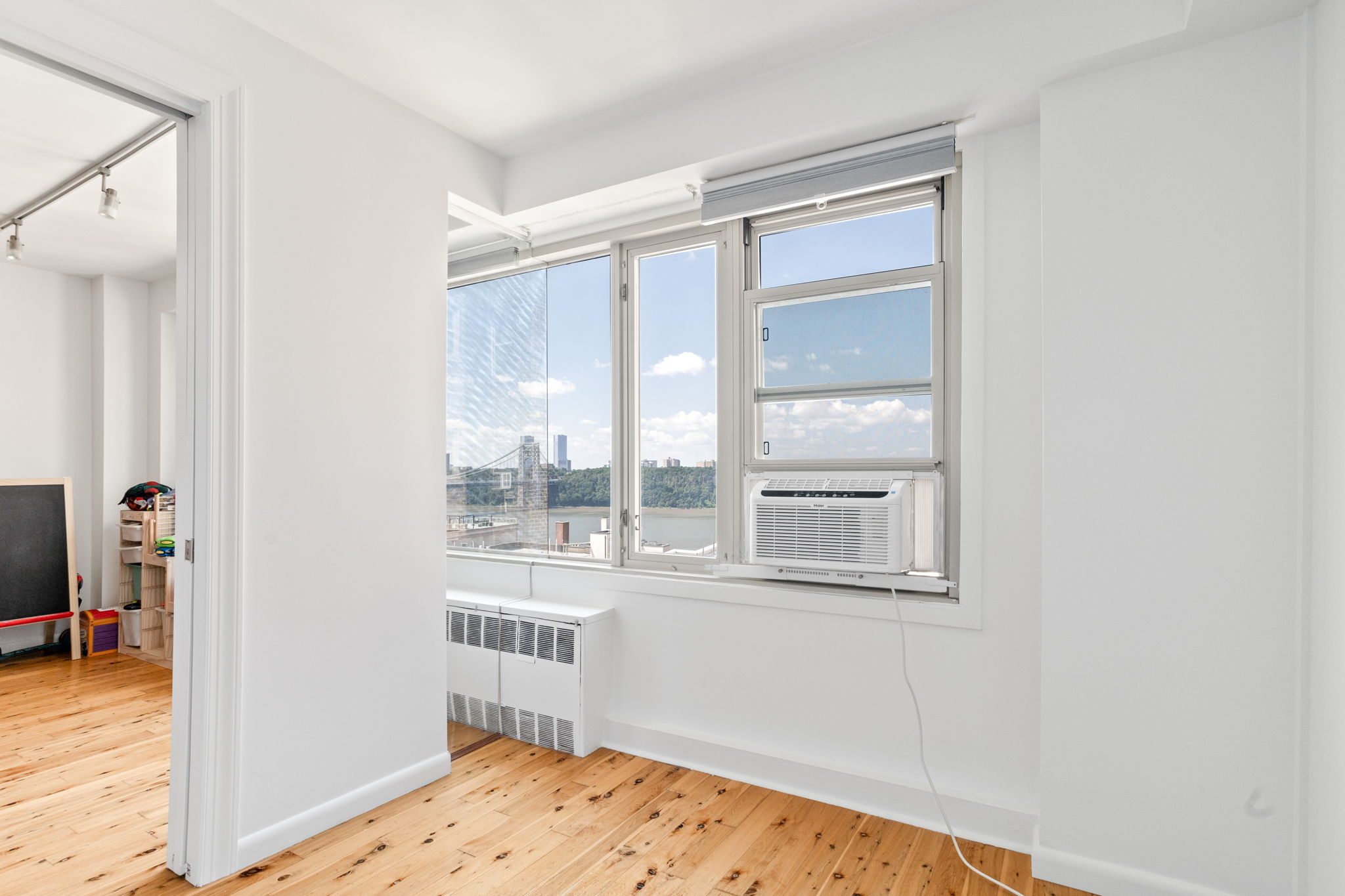 900 West 190th Street, Unit 11J Manhattan, NY 10040 - Photo 3 of 15 a very nice looking room with a large window