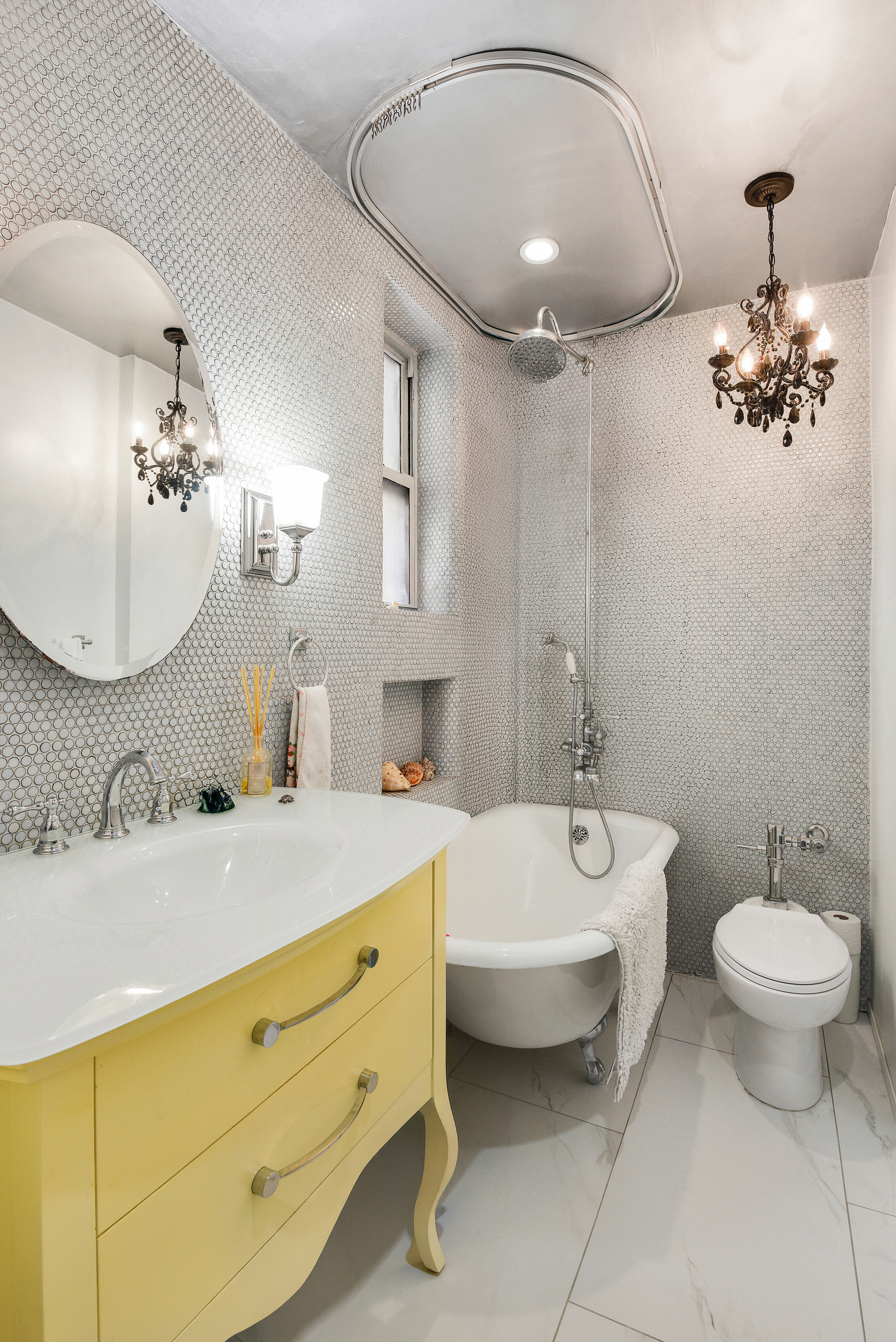 253 West 16th Street, Unit 3A Manhattan, NY 10011 - Photo 12 of 13 a bathroom with a double vanity sink mirror and toilet