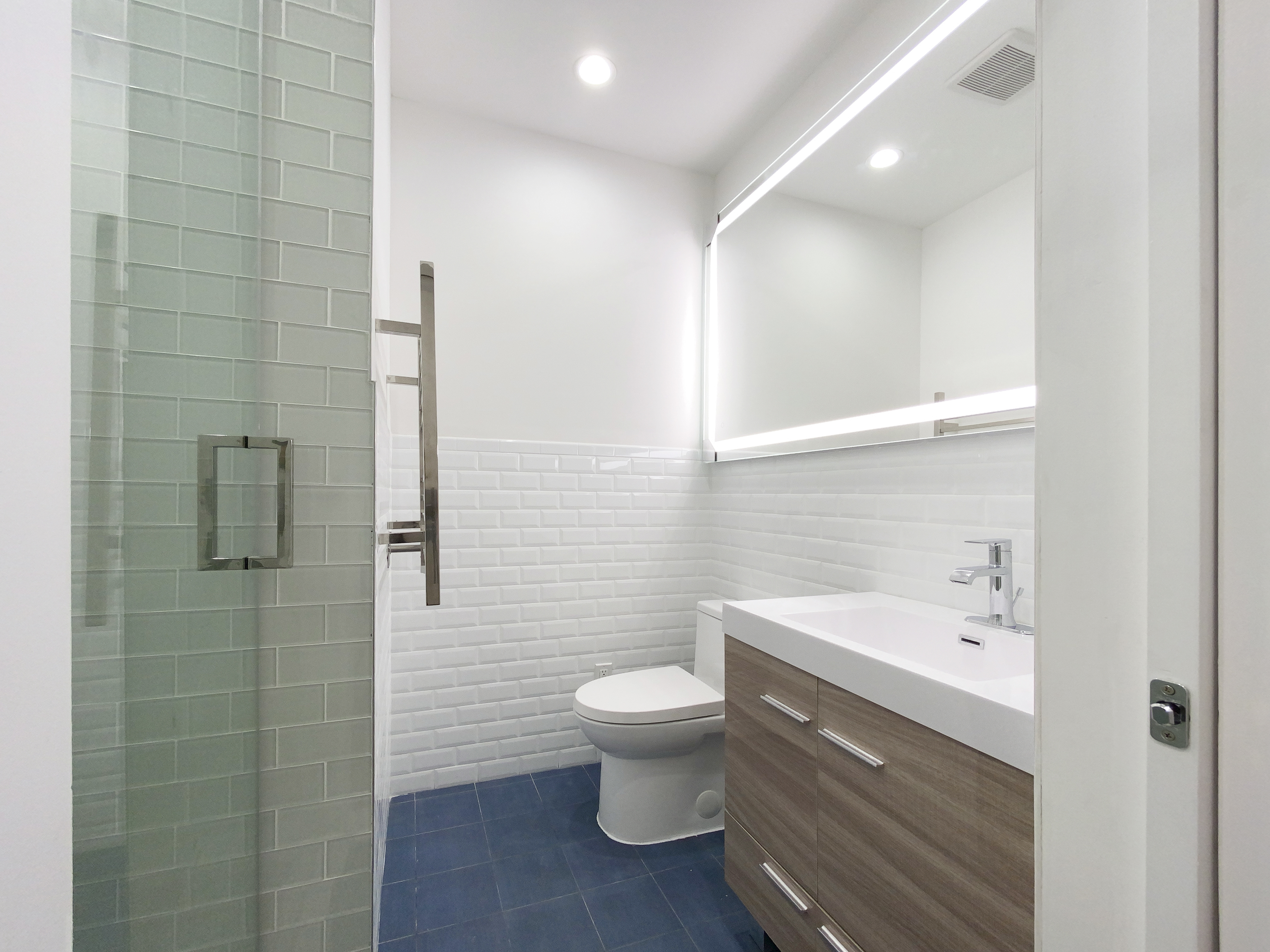 200 West 109th Street, Unit E4 Manhattan, NY 10025 - Photo 6 of 13 a bathroom with a sink a toilet and shower