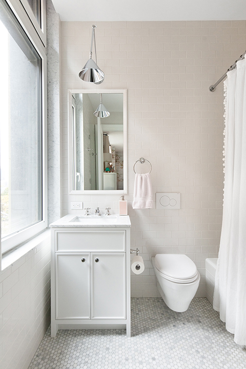 92 Laight Street, Unit 3ABC Manhattan, NY 10013 - Photo 20 of 26 a bathroom with a granite countertop sink a toilet and a mirror